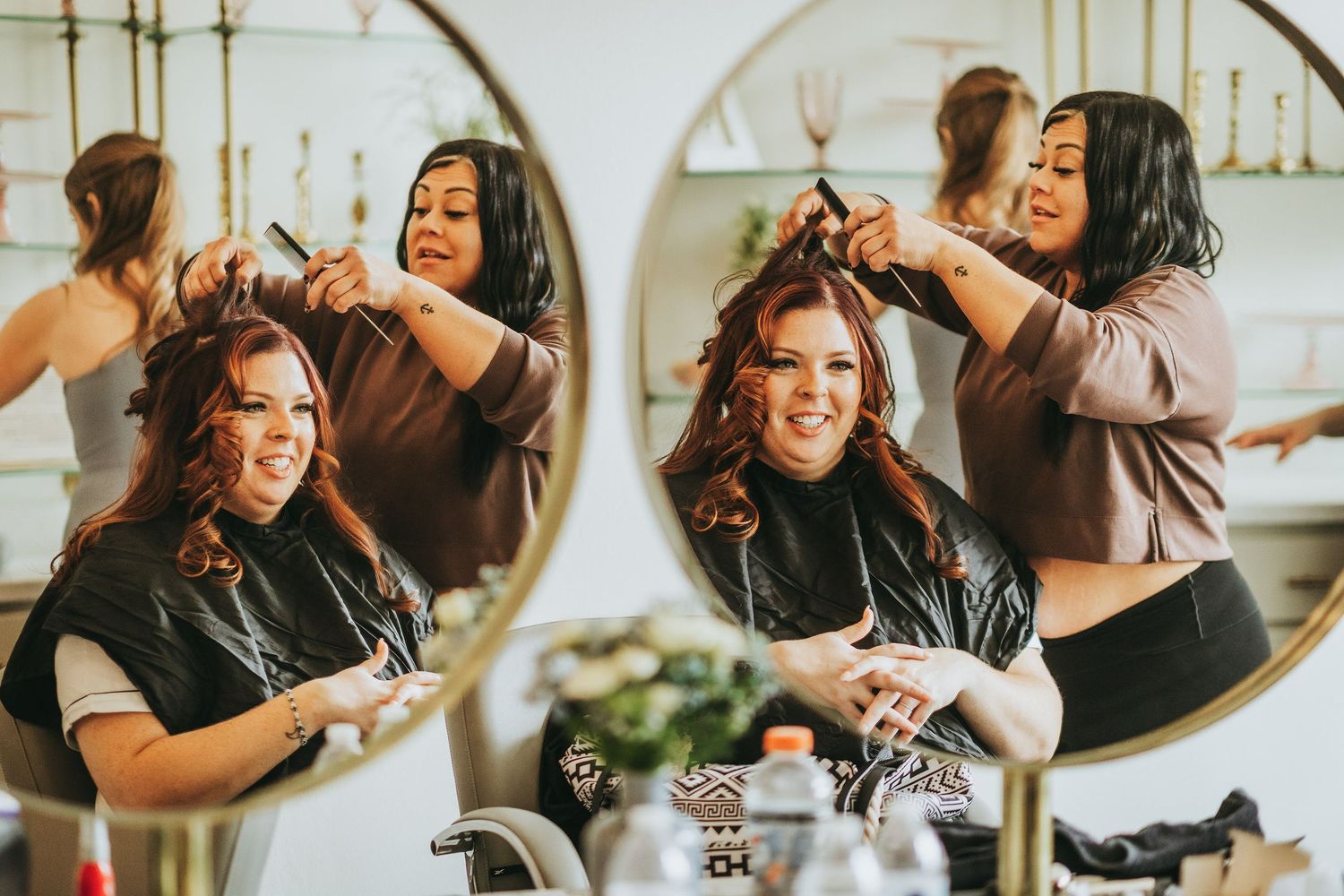Getting ready scene with mirrors and preparations for a wedding day.