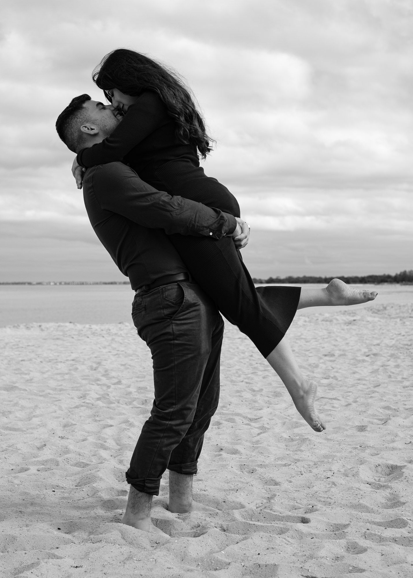Windswept lifestyle couples portrait on Melbourne beach