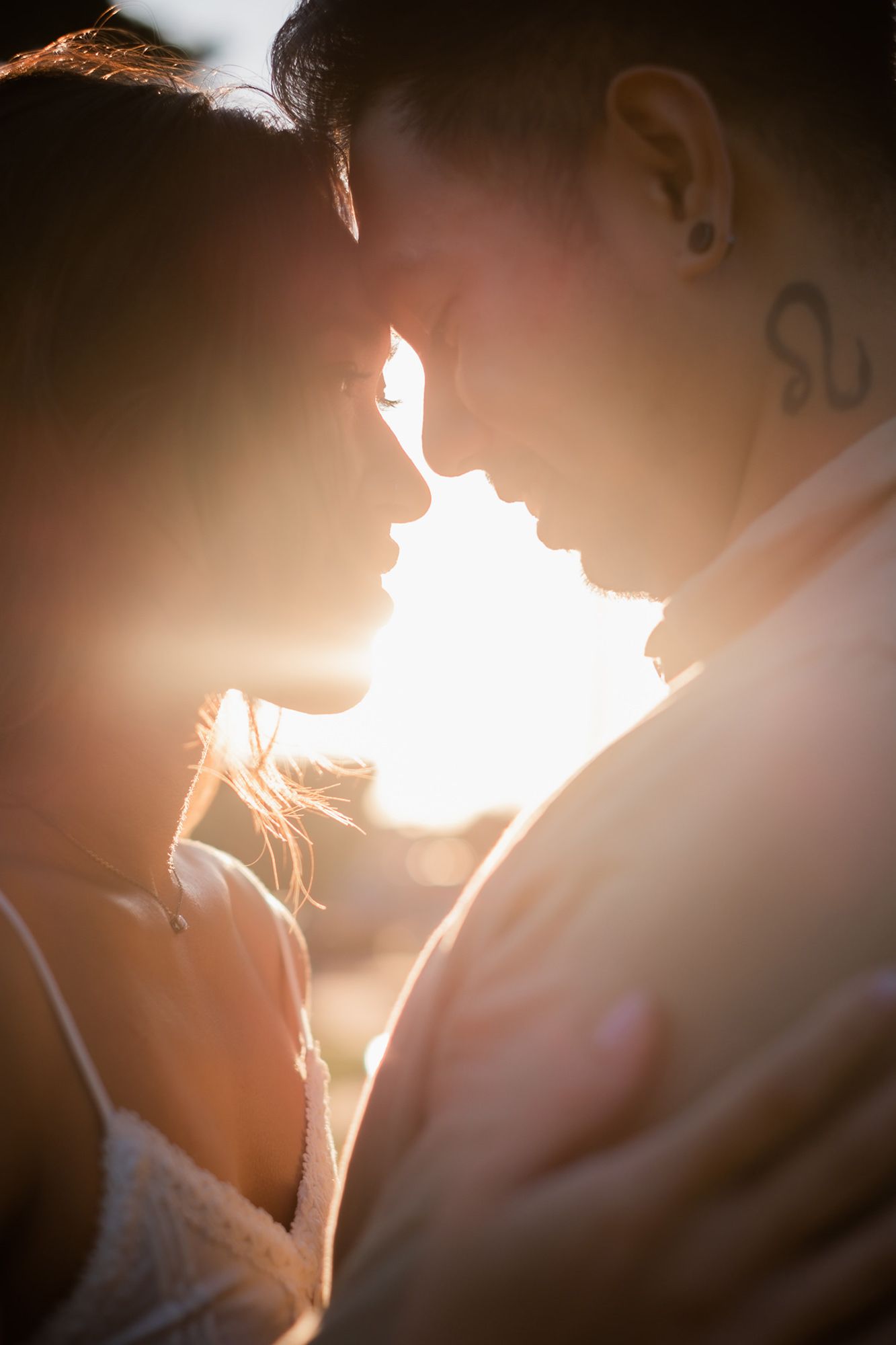 Silhouette couples photography on Melbourne beach at sunset