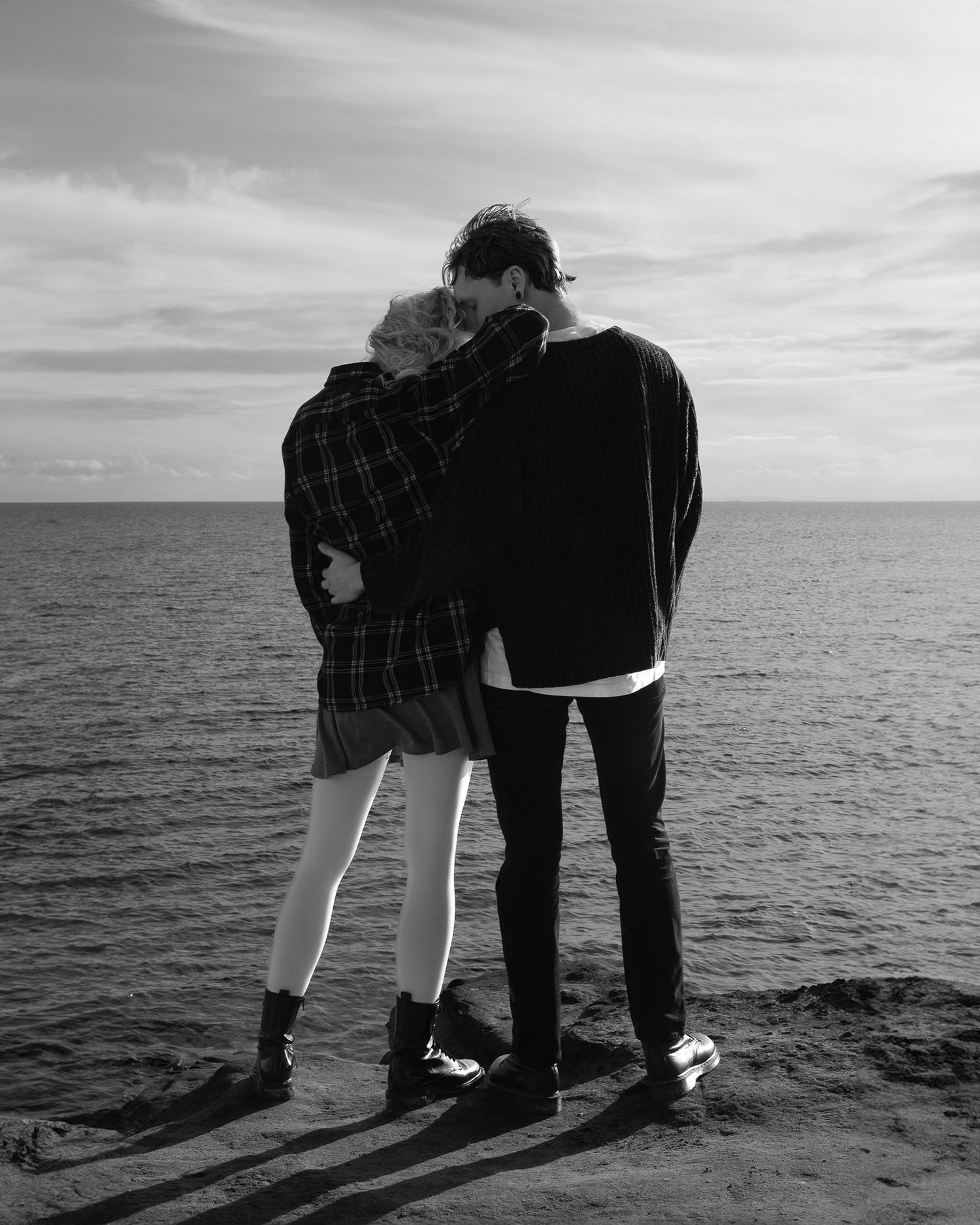 Romantic portrait embracing at Half Moon Bay Melbourne