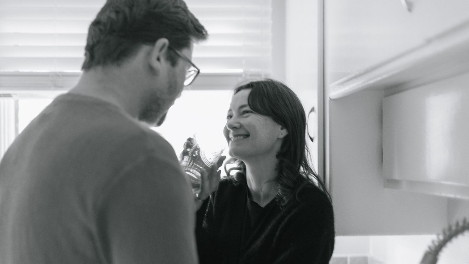 Black and white panoramic series showing couple's intimate moments.