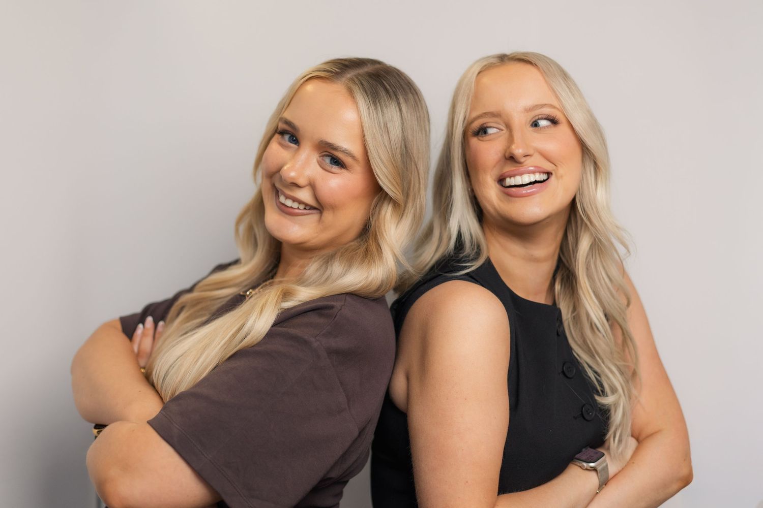 Professional studio portraits showing a sequence of joyful poses and expressions in matching outfits.