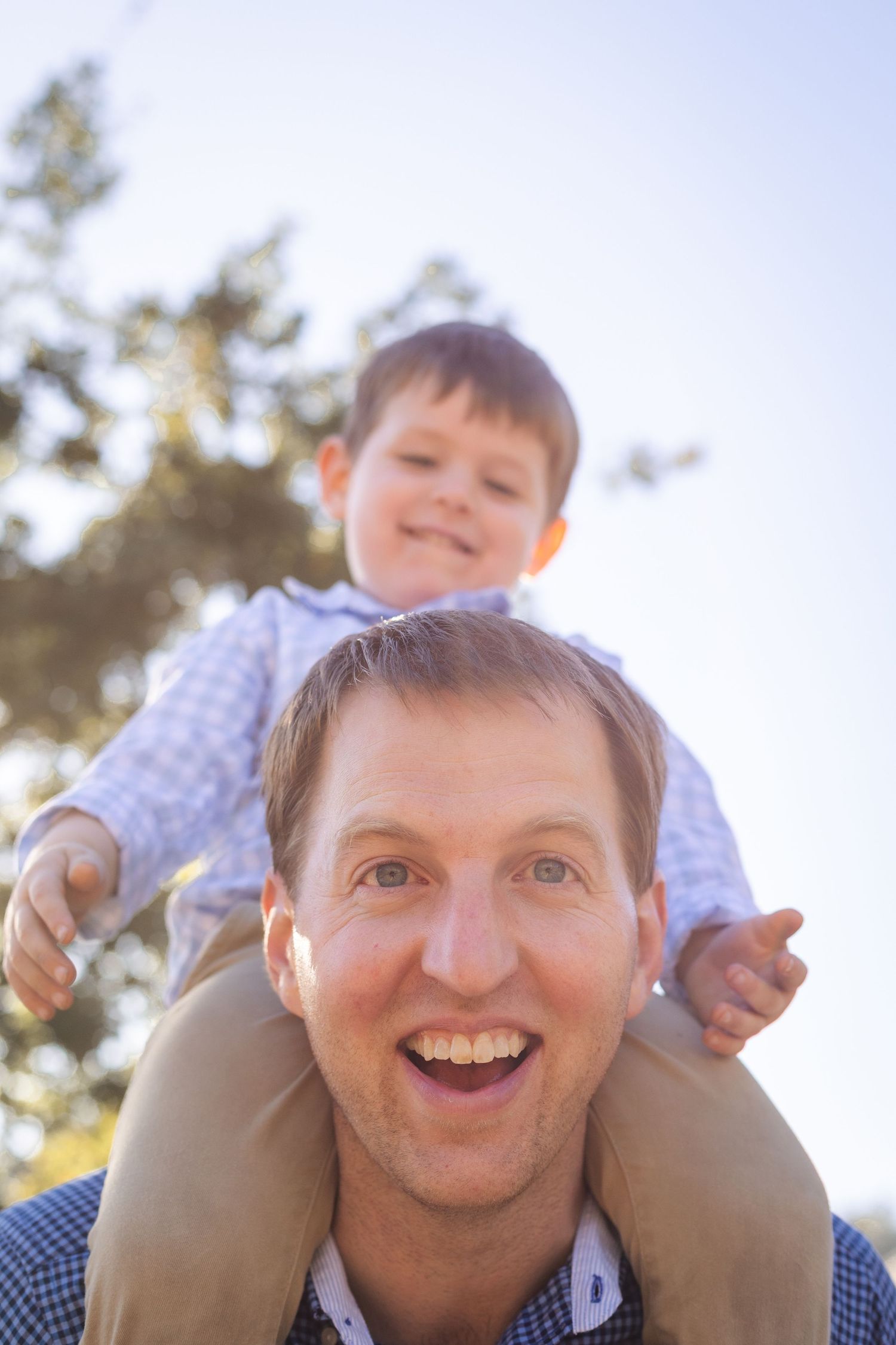 Dad and son natural cinema style photograph.