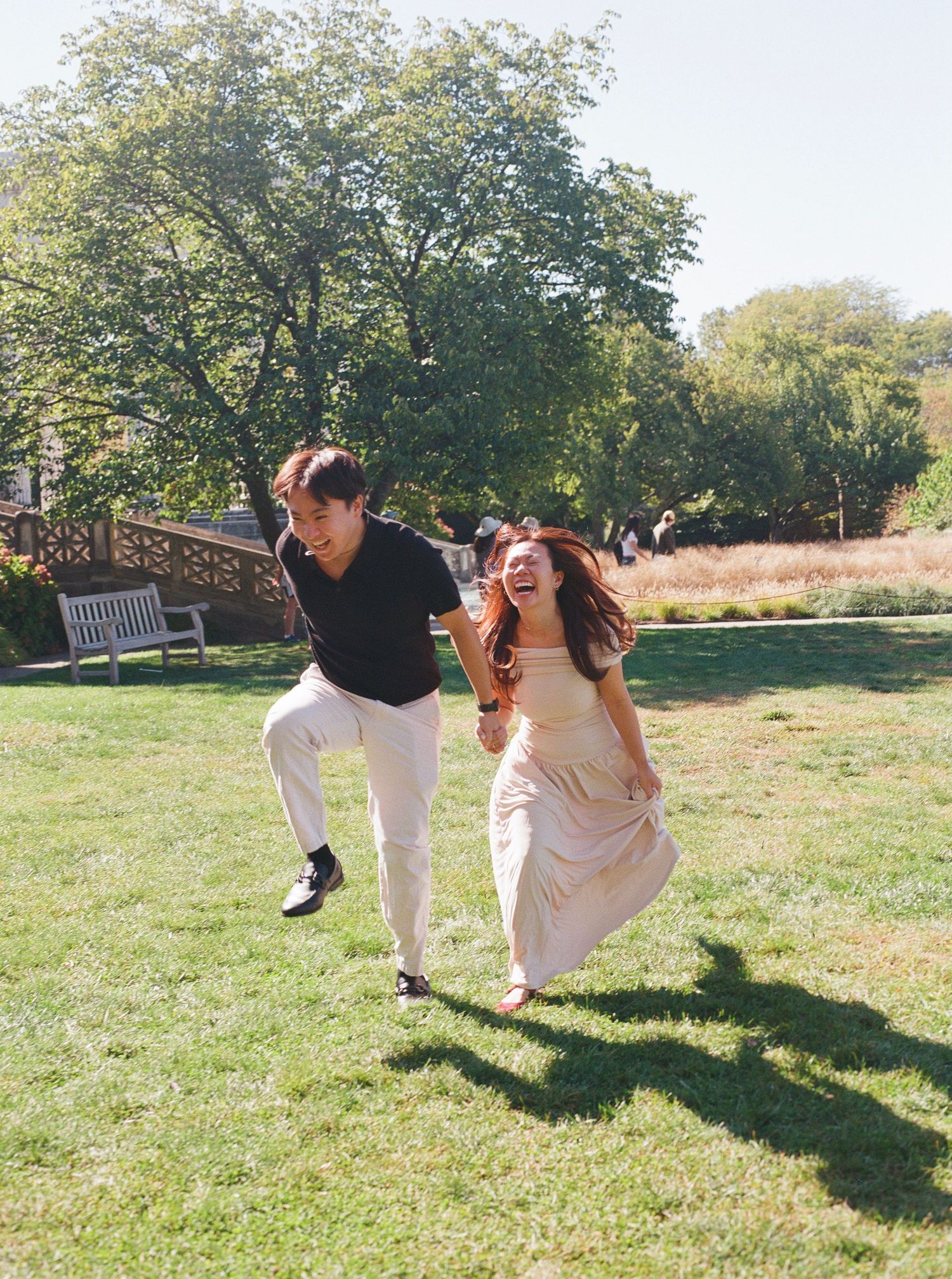 Sequence of playful dance moves captured in a sunny outdoor field.