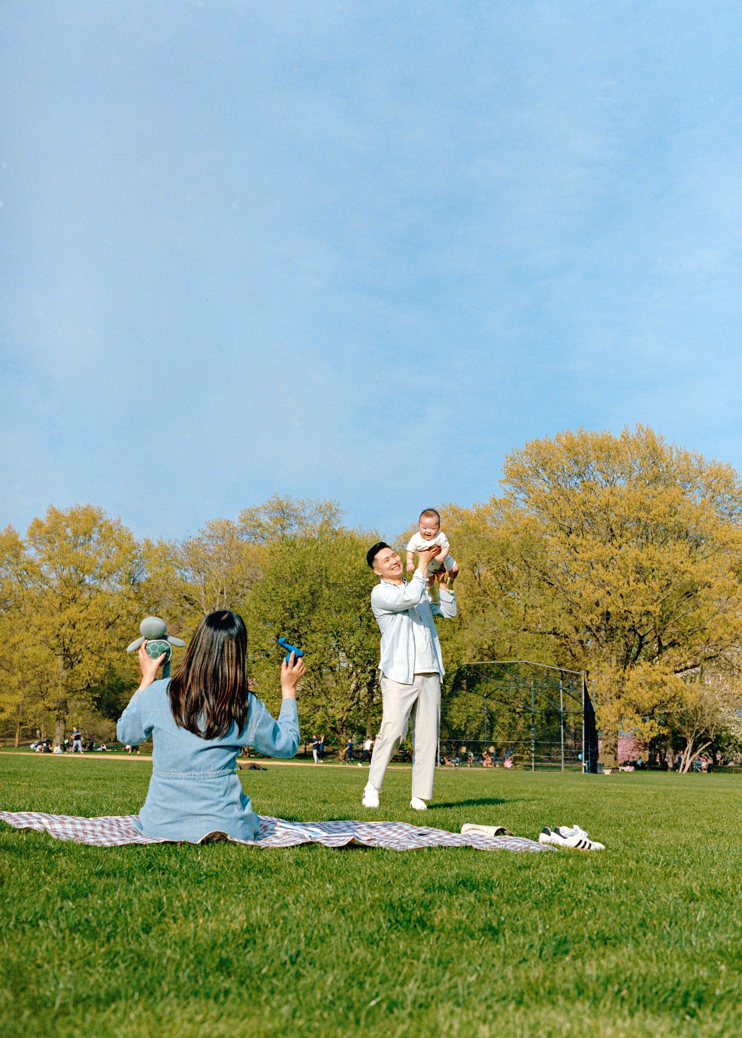 Korean family photography shoot in Spring in Central Park, shot on film