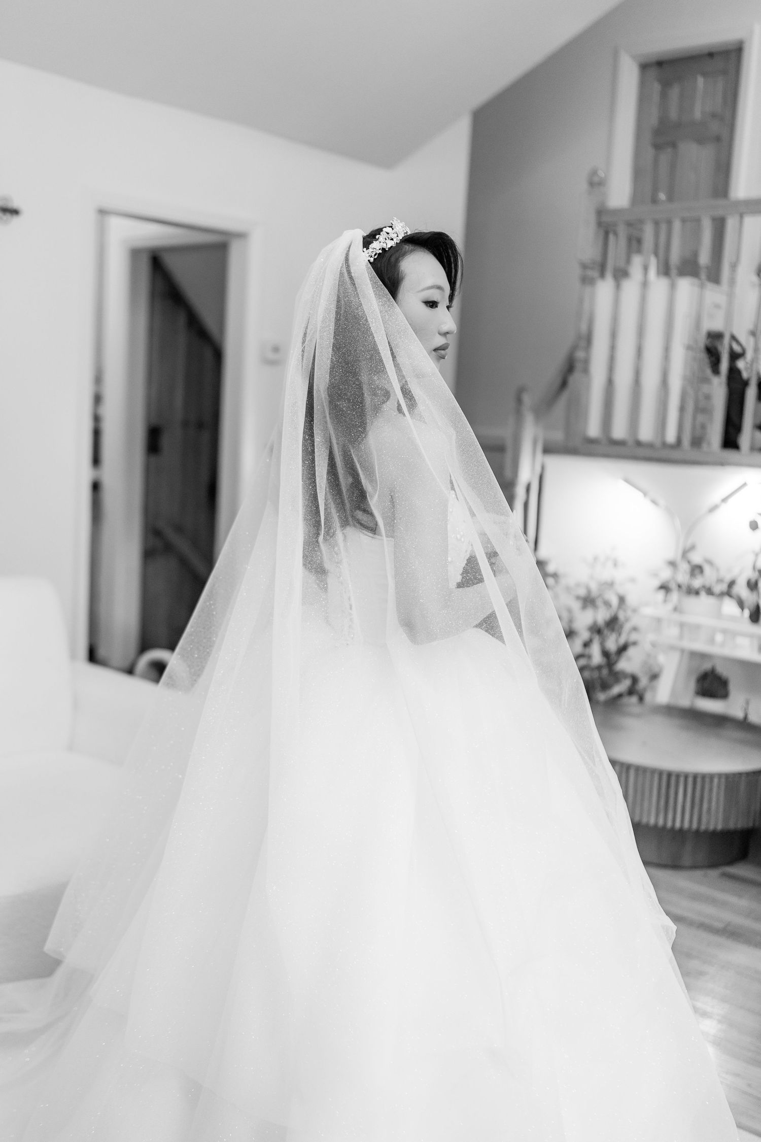 Elegant bridal portraits featuring flowing white veil and wedding dress details.