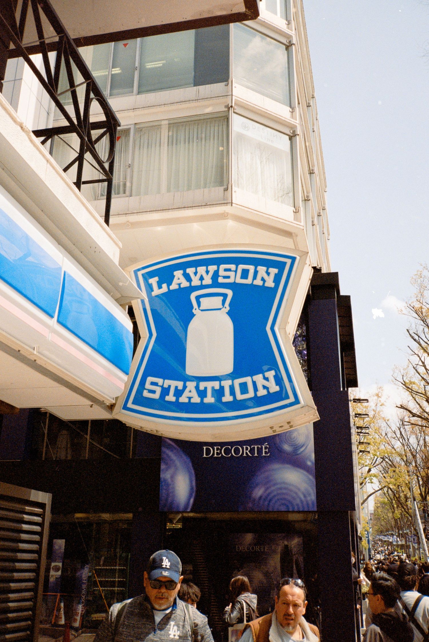 Lawson Station storefront with blue and white signage in an urban setting.