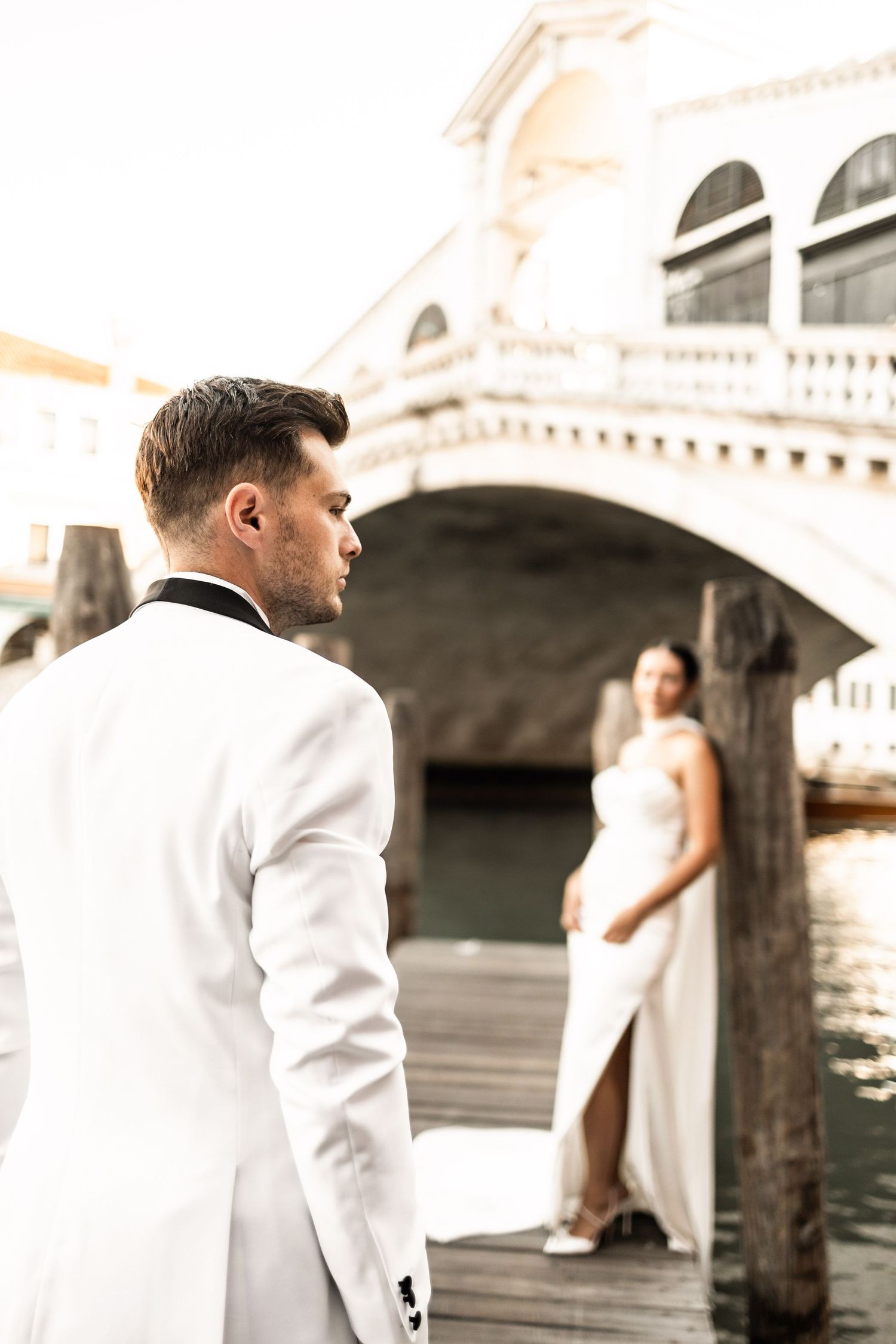 Artistic wedding photography session along Venice's iconic waterways.