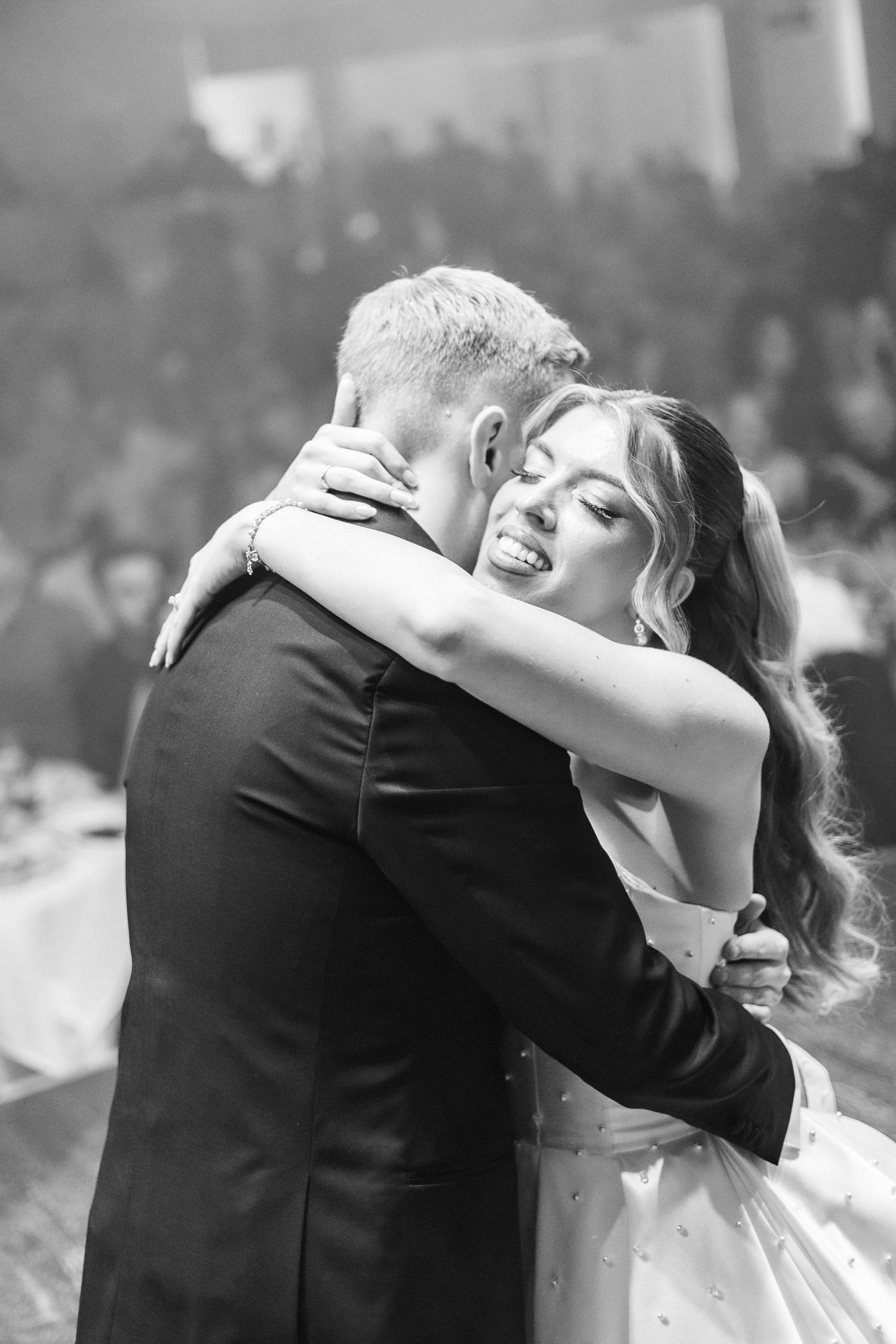Black and white romantic dance sequence showing an intimate wedding moment.