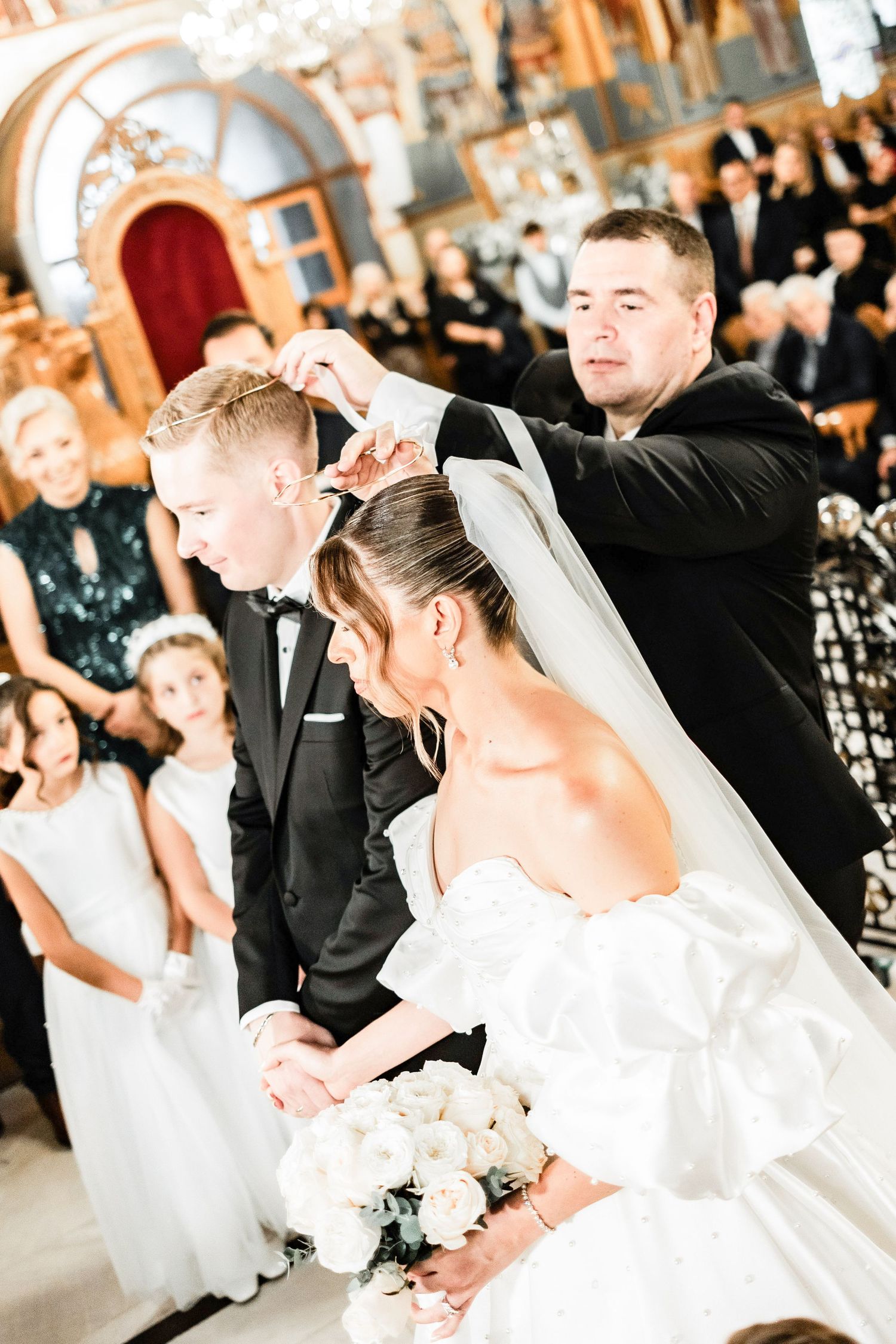 Elegant wedding dance sequence showing a flowing white dress and formal attire in motion.