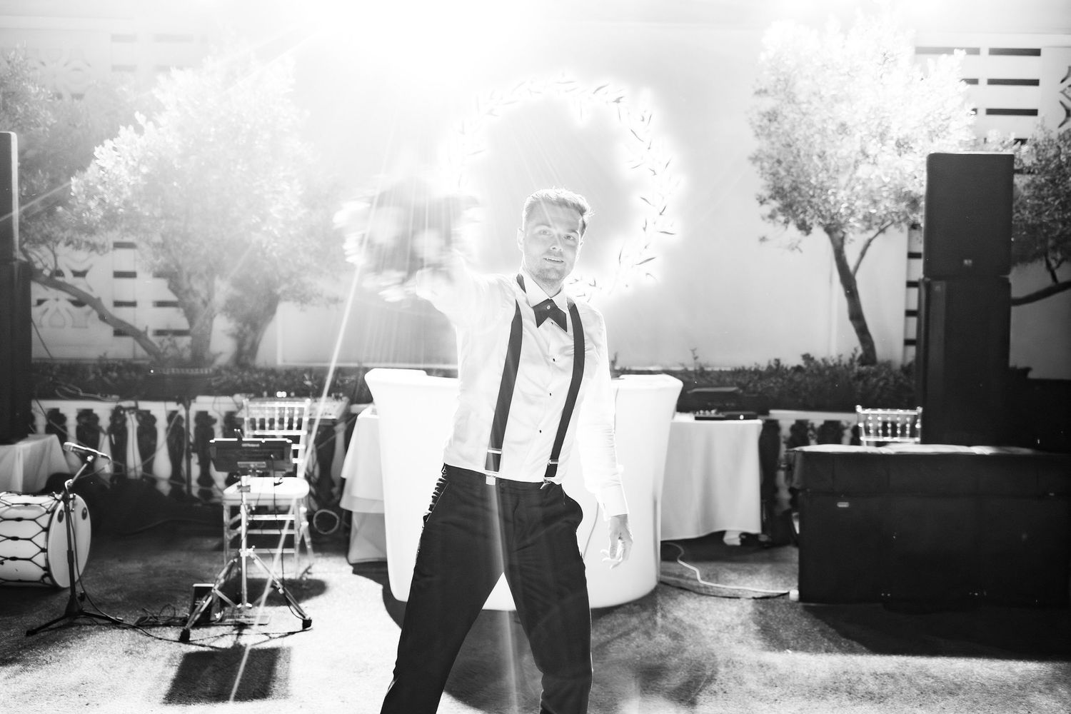 Wedding celebration candid moments captured in black and white photography.