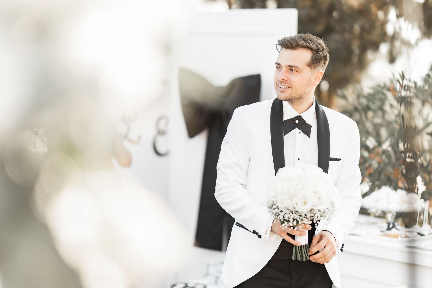 Romantic wedding day preparation photos with soft bokeh lighting effects.