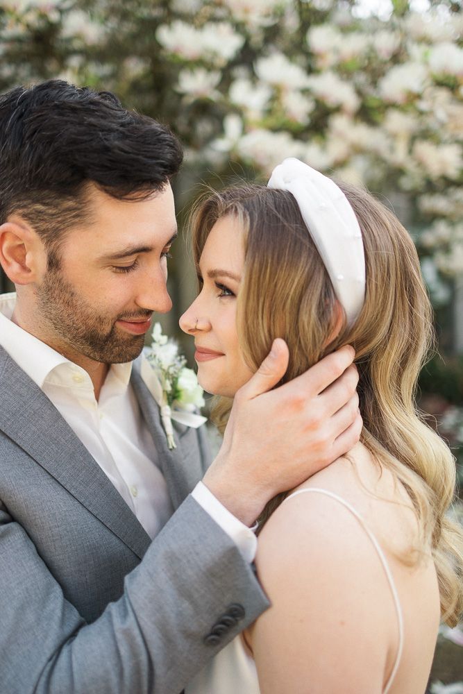 A romantic close-up of a couple sharing an intimate moment during their wedding.