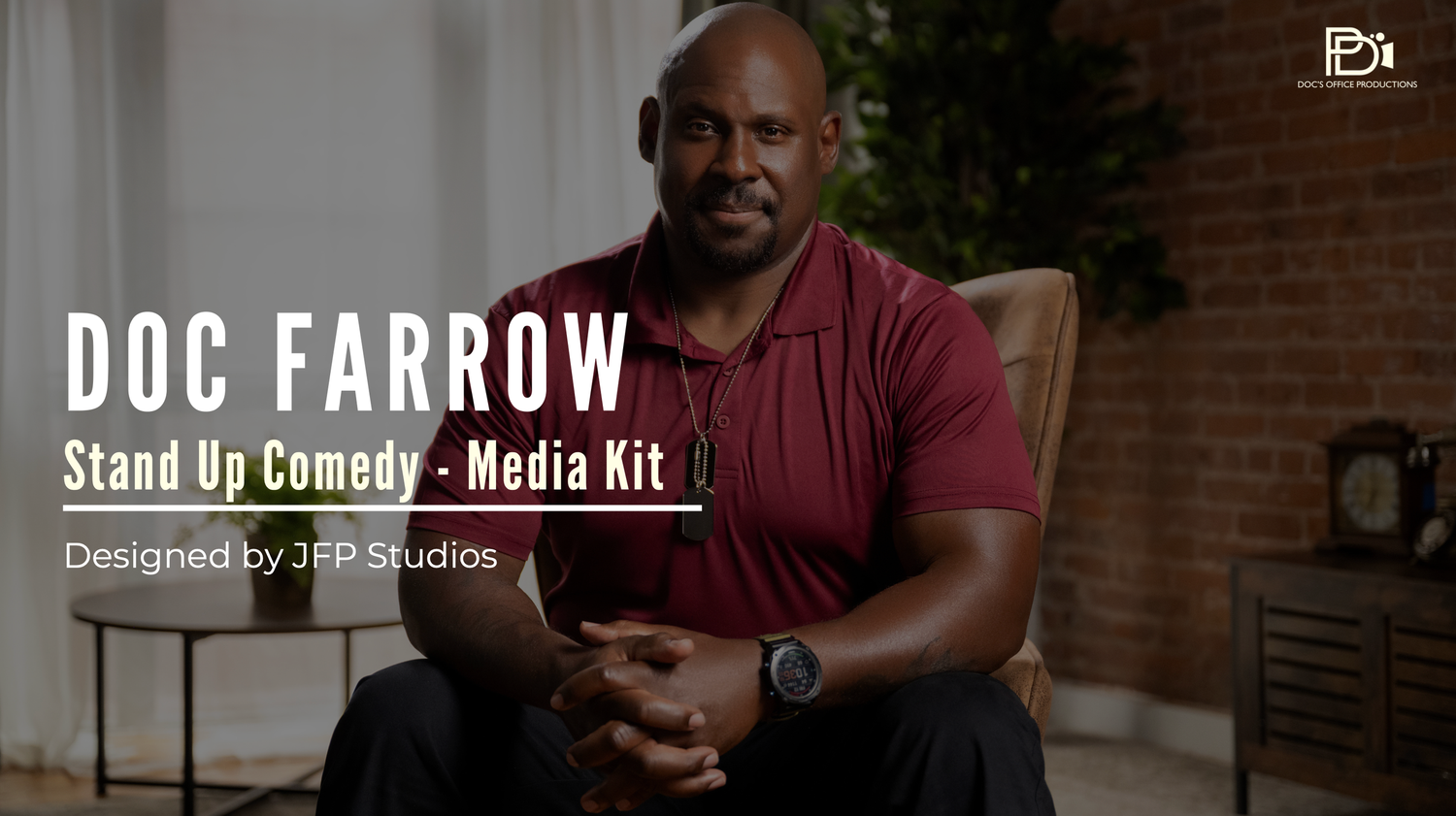 Doc Farrow in a burgundy shirt sits for his comedy media kit promotional photo in a home studio setting.