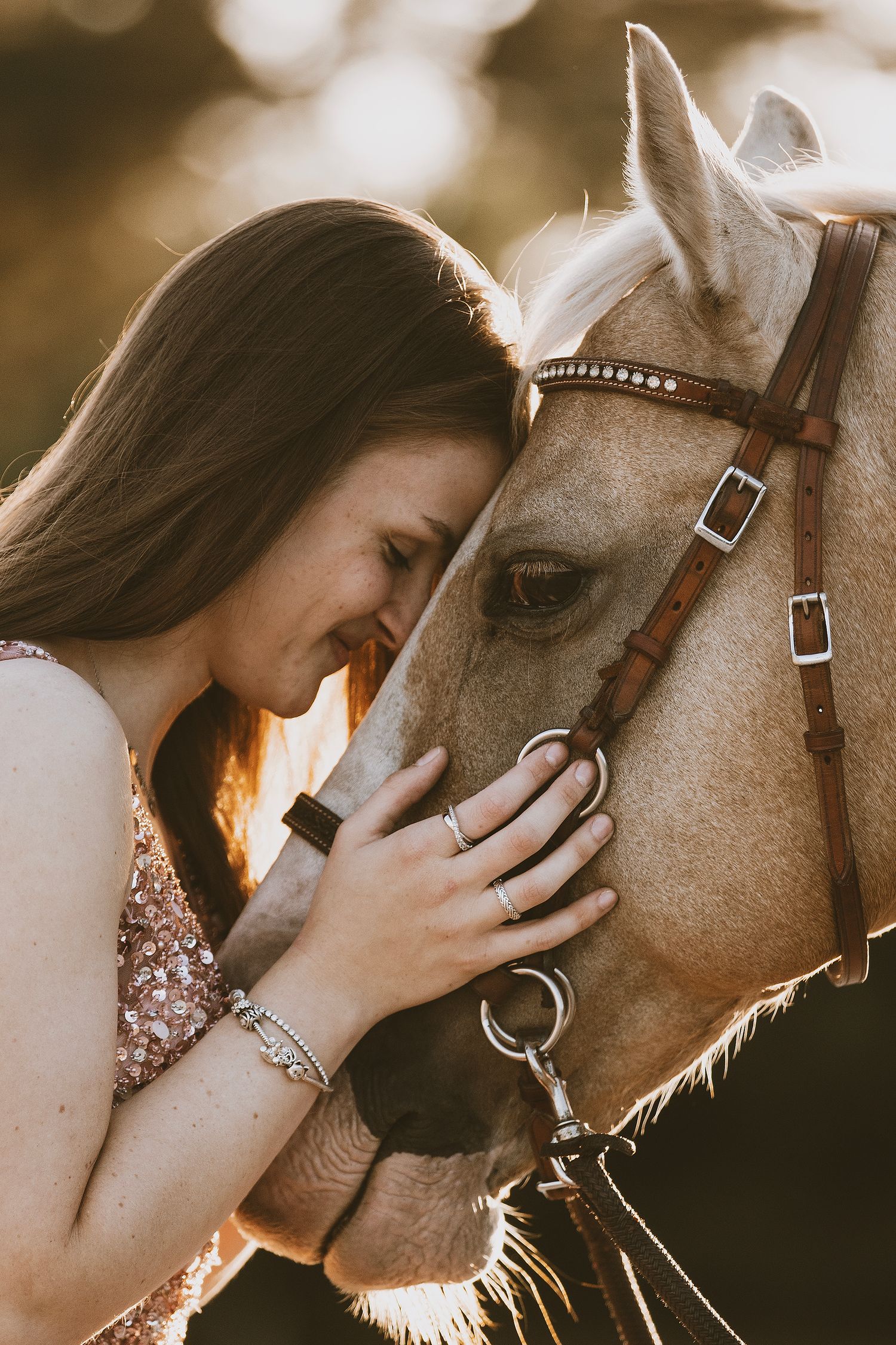 A series of intimate sepia-toned photos showing tender moments between a person and their horse at sunset.