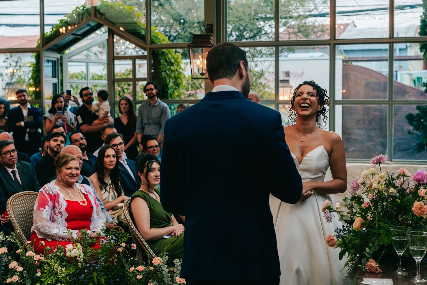 Emotional greenhouse wedding ceremony at Botânico Quintal in São Paulo, Brazil.