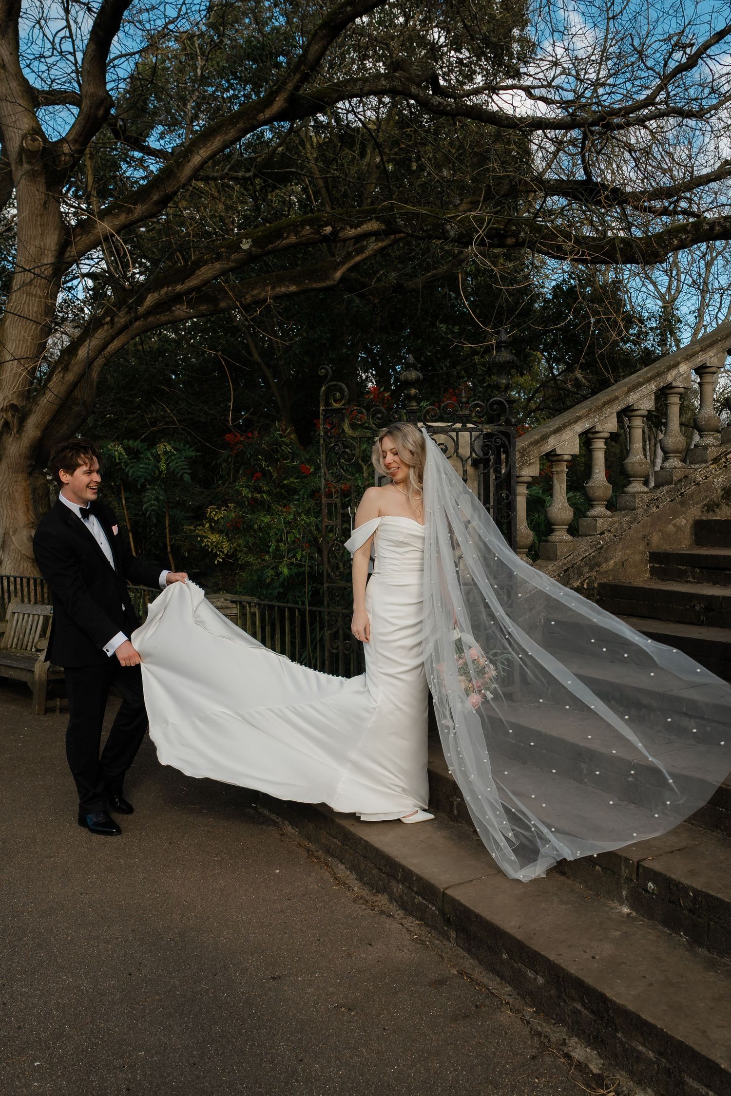 Romantic couple portrait on bridge at York House gardens