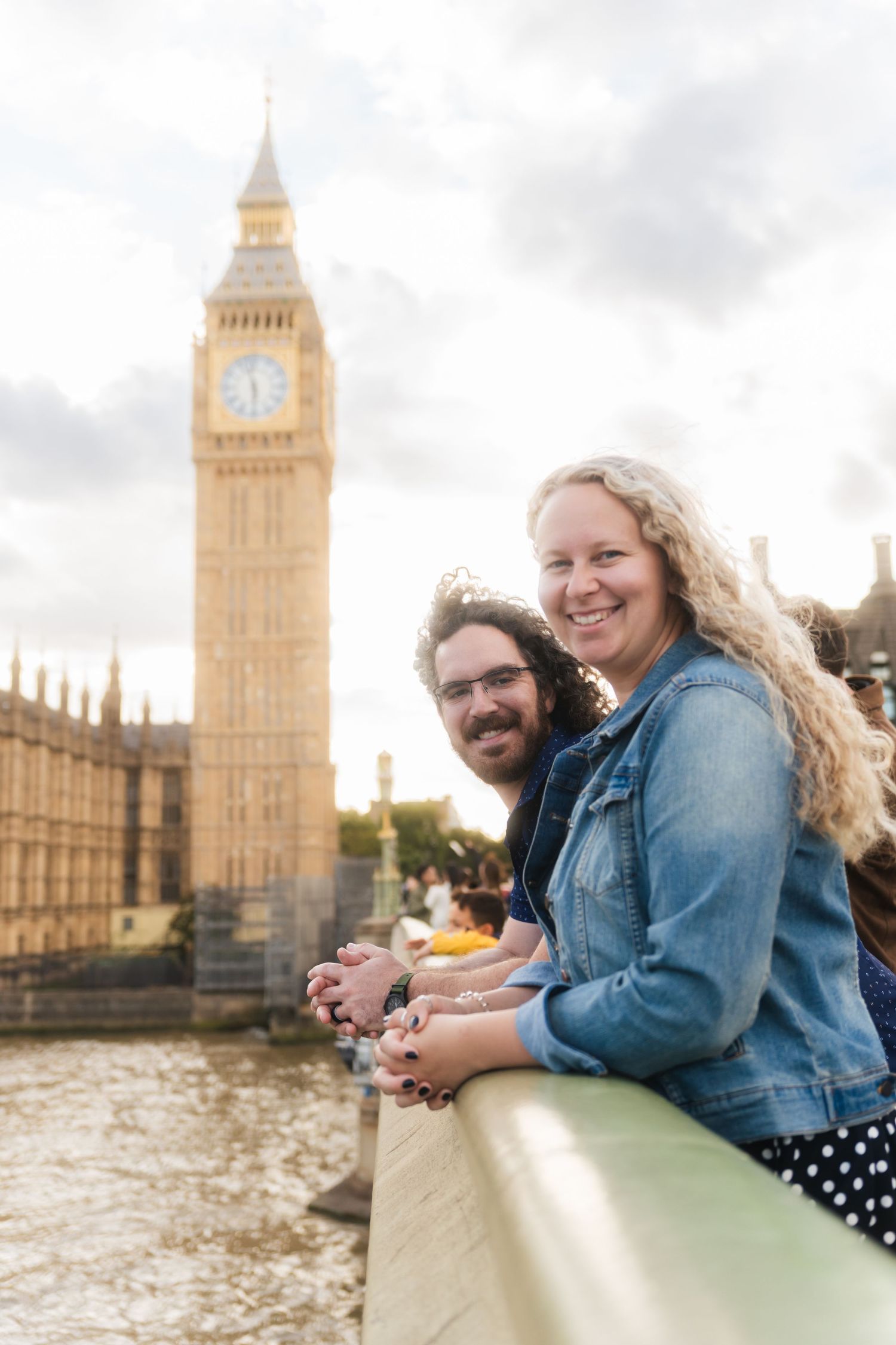Couple on Westminster Bridge at sunset with Big Ben behind them captured by UK Photographer @lyfphotos