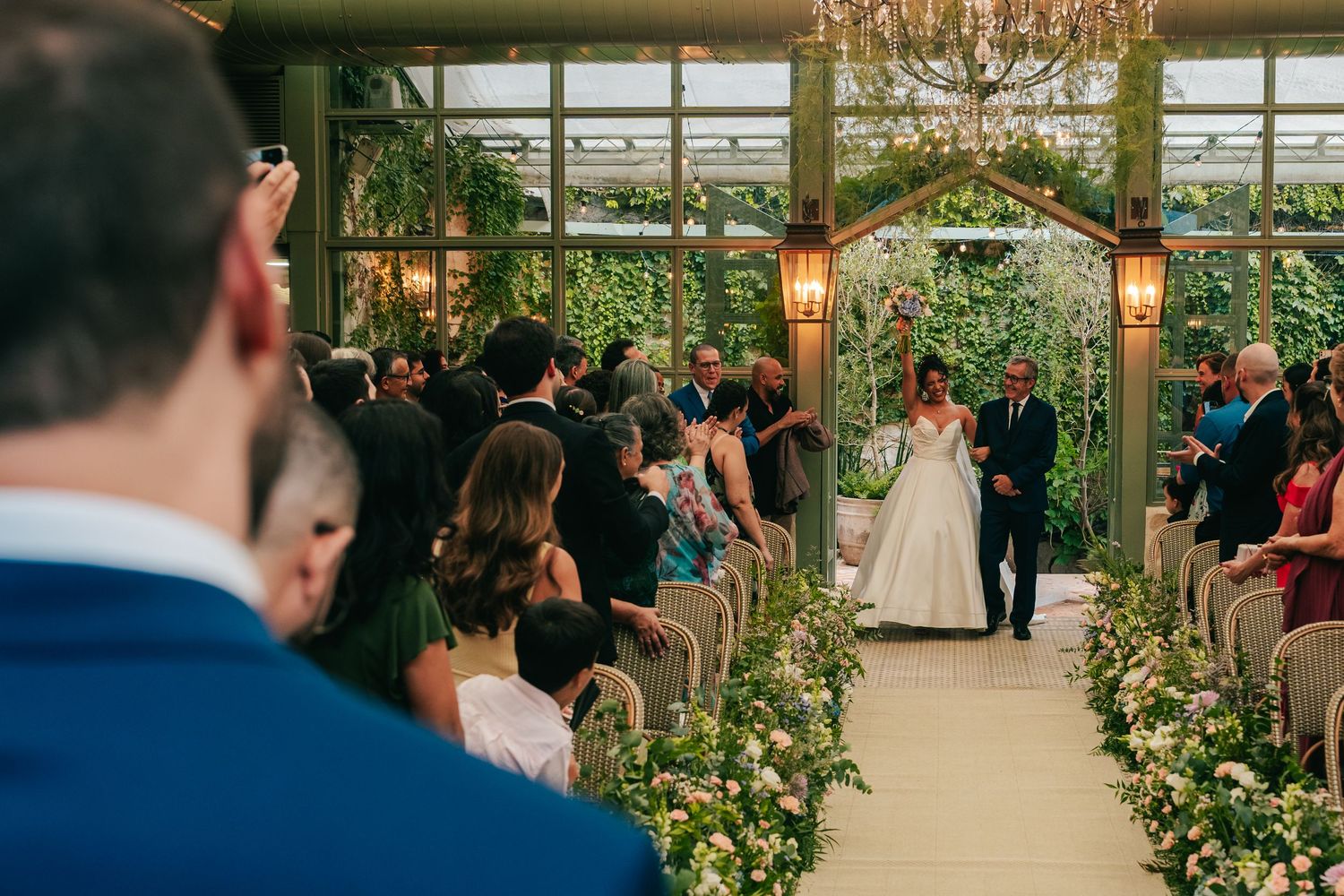 Emotional greenhouse wedding ceremony at Botânico Quintal in São Paulo, Brazil.