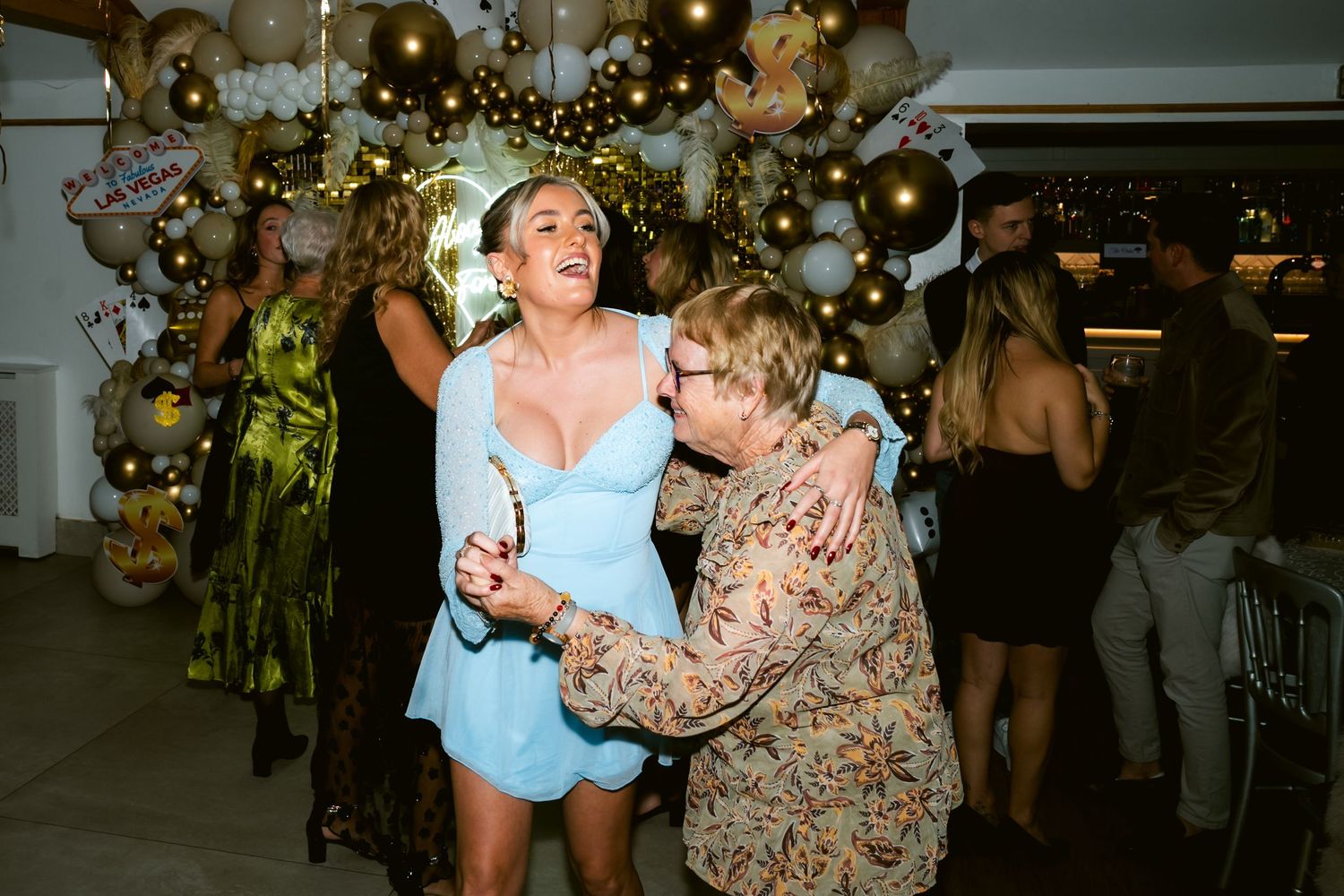Guests celebrating at an elopement party at The Oaks Eltham in London by @lyfphotos