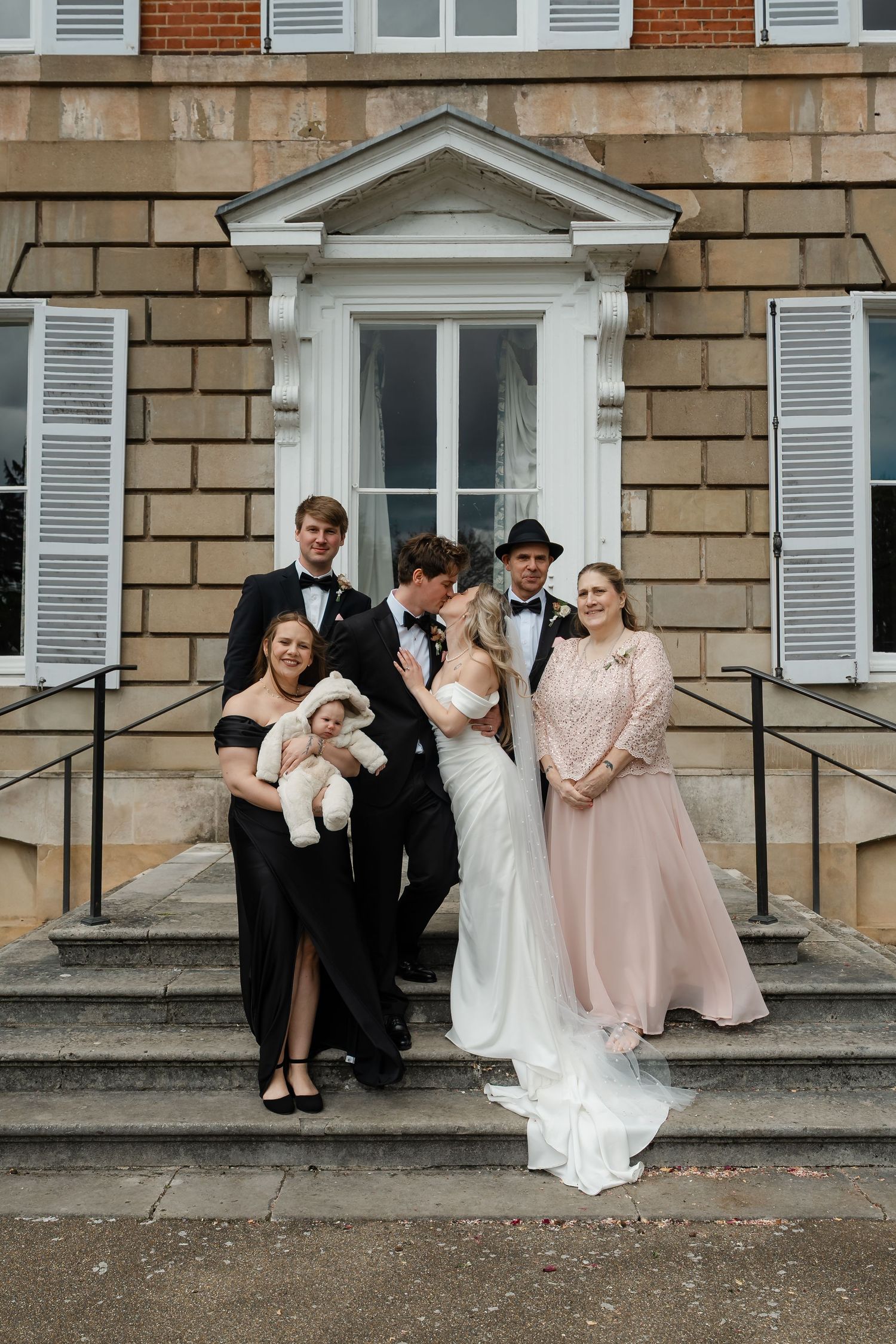 Family group portraits with York House architecture in background