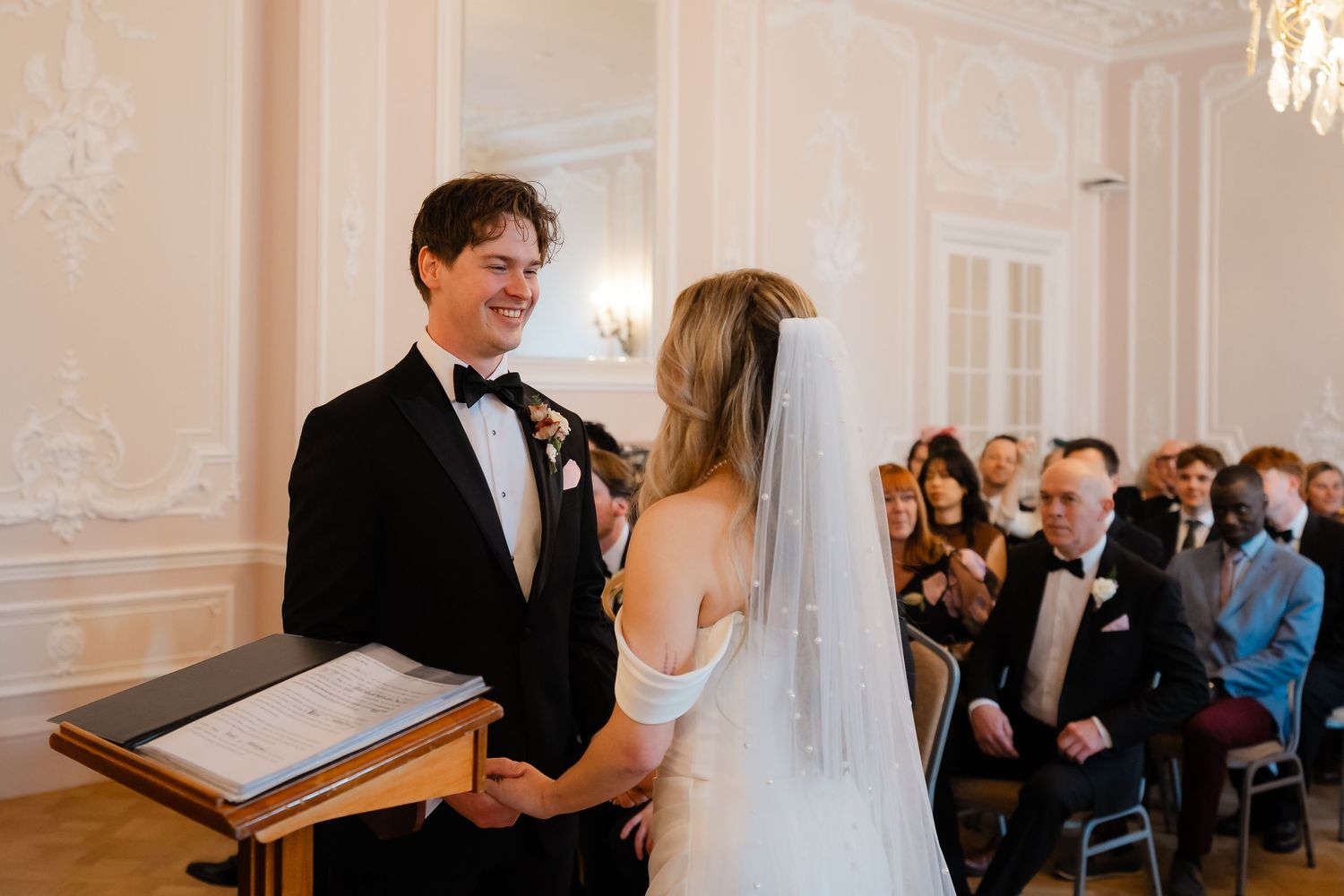 Ceremony inside The Salon pink room at York House Twickenham