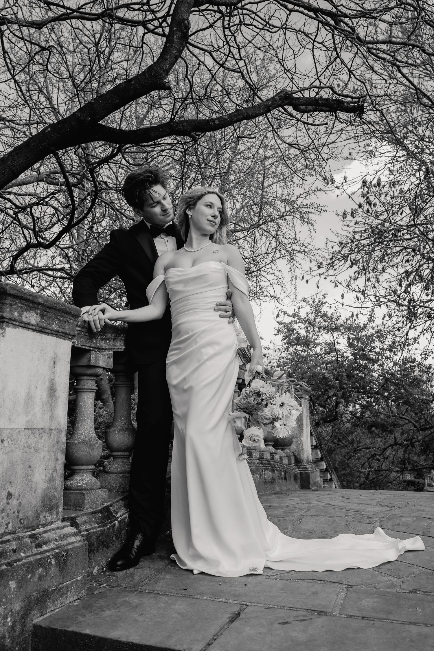 Romantic couple portrait on bridge at York House gardens