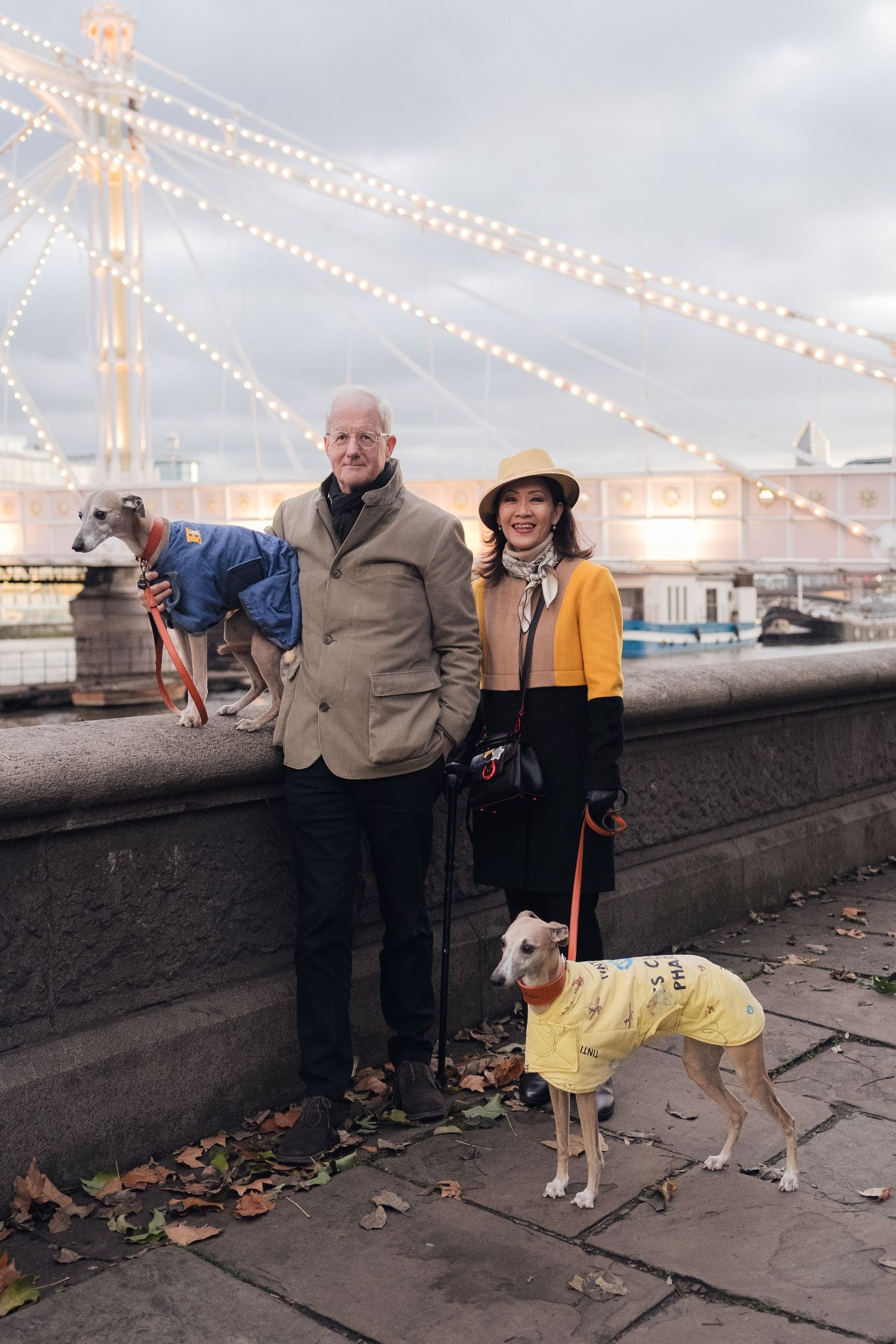 Caecilia and Hugh on Albert Bridge Chelsea during a London Christmas photoshoot, photographed by London UK photographer @lyfphotos