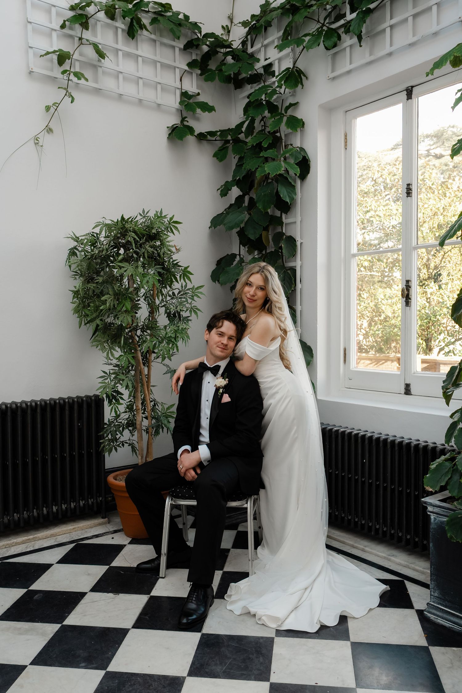 Bride and groom portraits in York House conservatory greenhouse