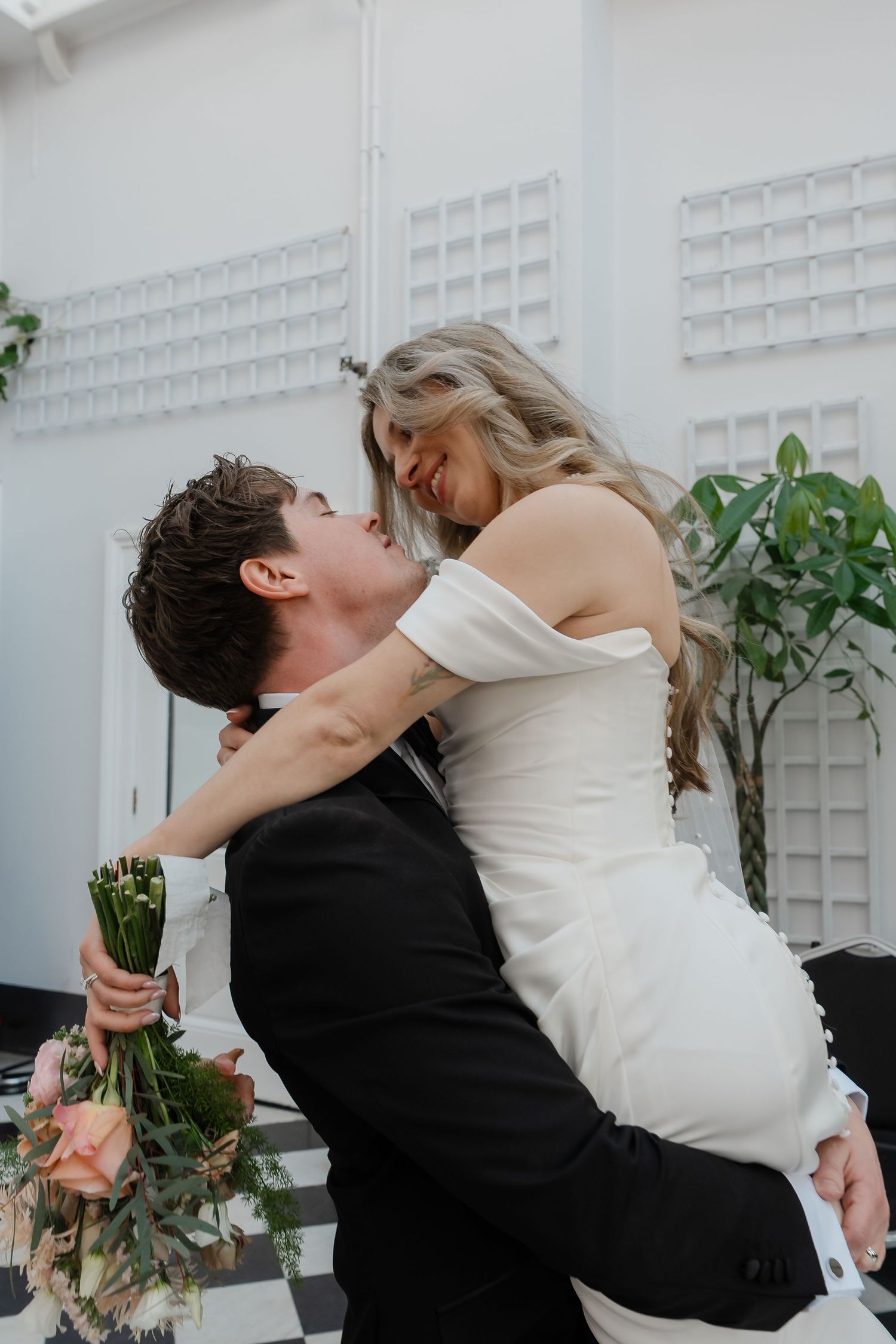 Bride and groom portraits in York House conservatory greenhouse