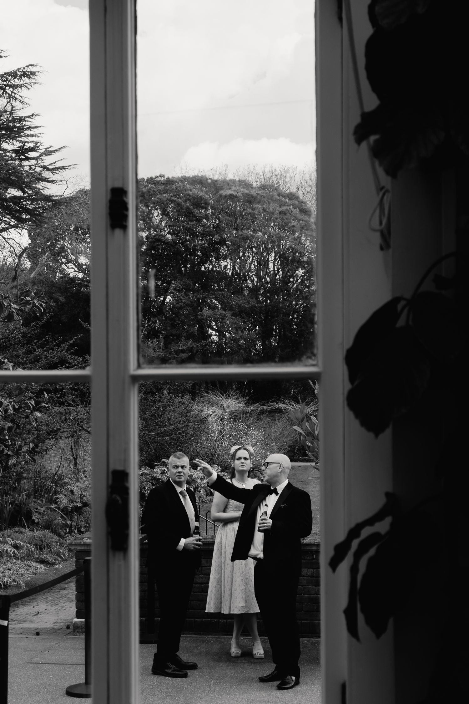 Guests enjoying cocktails in York House conservatory