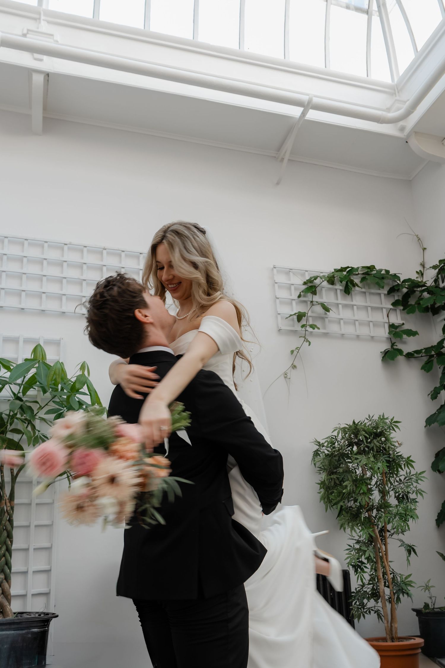 Bride and groom portraits in York House conservatory greenhouse