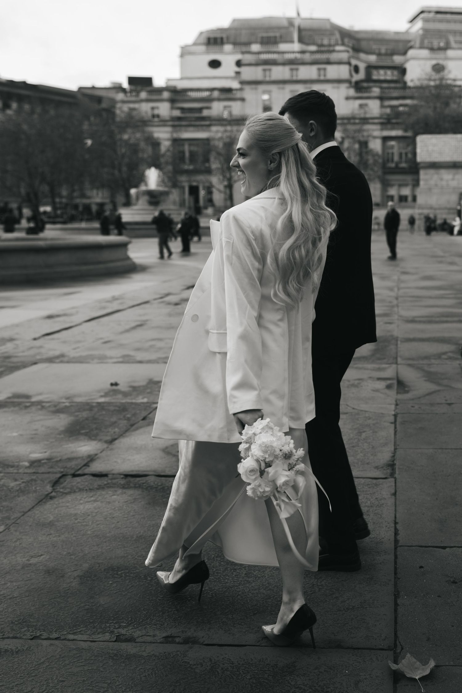 “Couple in Trafalgar Square by the National Gallery during a London couples photoshoot.”