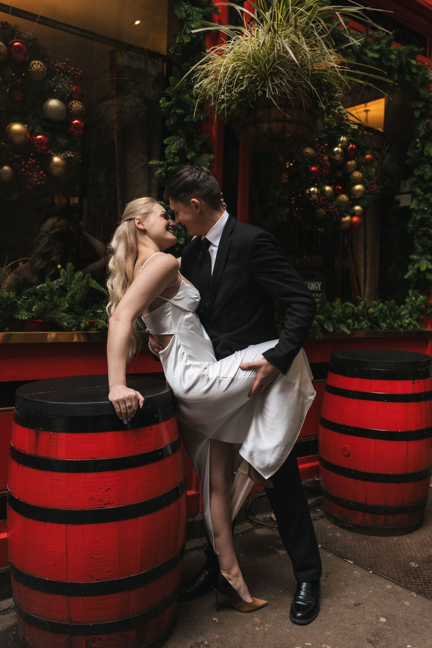 “Couple at The Ship & Shovell pub in Central London during a romantic London photoshoot.”