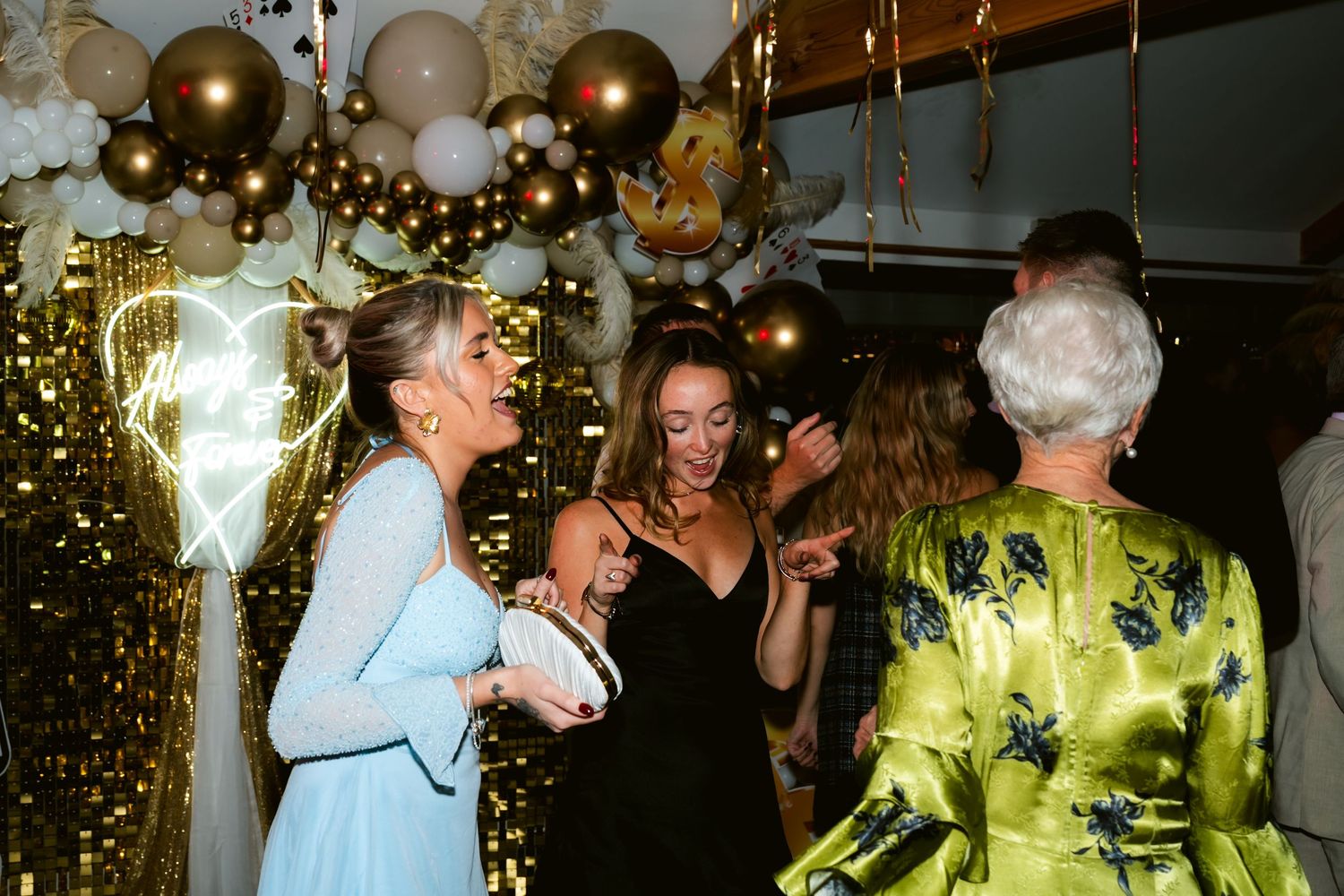 Guests celebrating at an elopement party at The Oaks Eltham in London by @lyfphotos