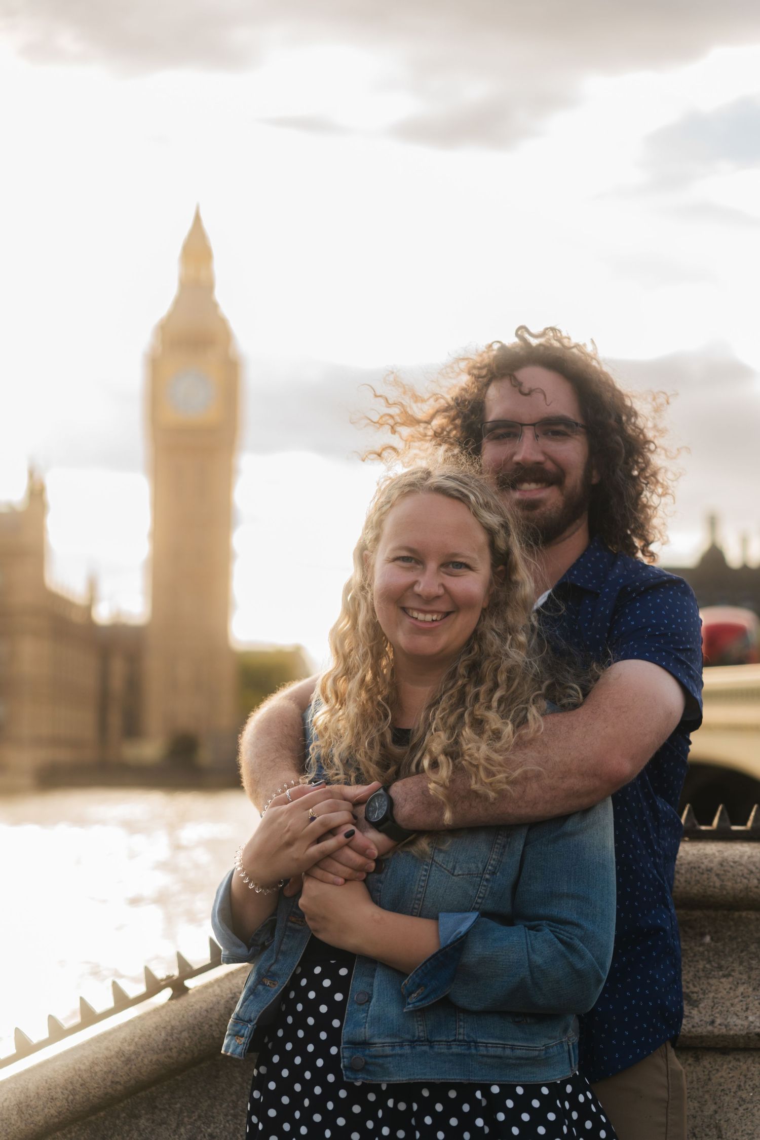 Couple on Westminster Bridge at sunset with Big Ben behind them captured by UK Photographer @lyfphotos