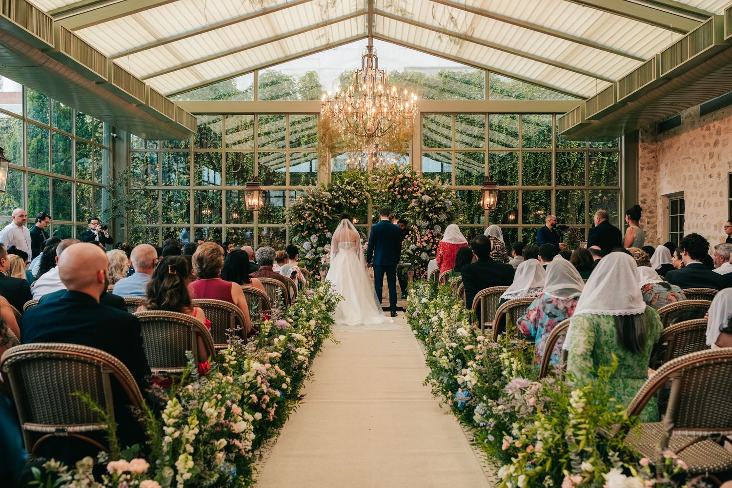 Emotional greenhouse wedding ceremony at Botânico Quintal in São Paulo, Brazil.