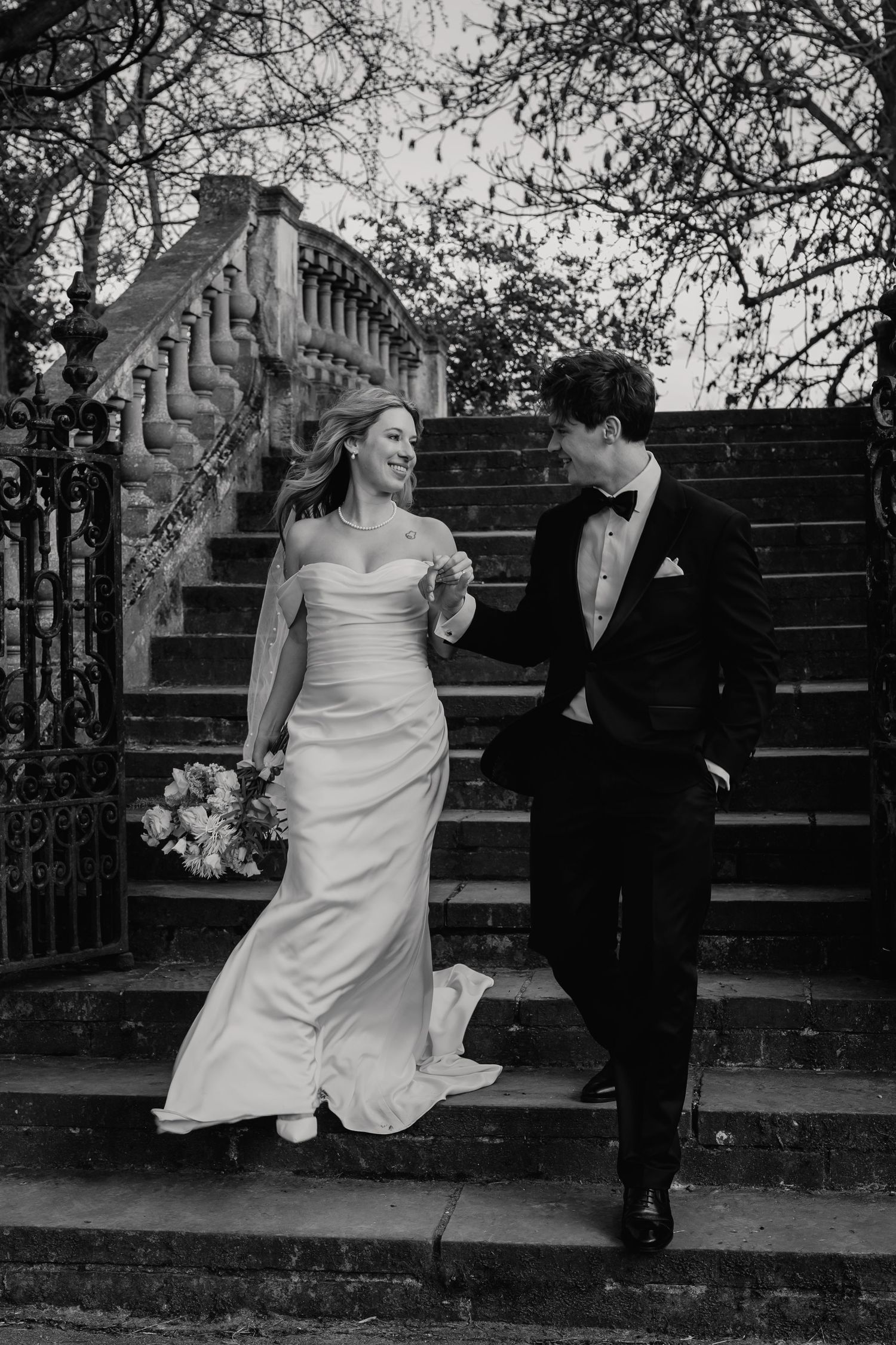 Romantic couple portrait on bridge at York House gardens