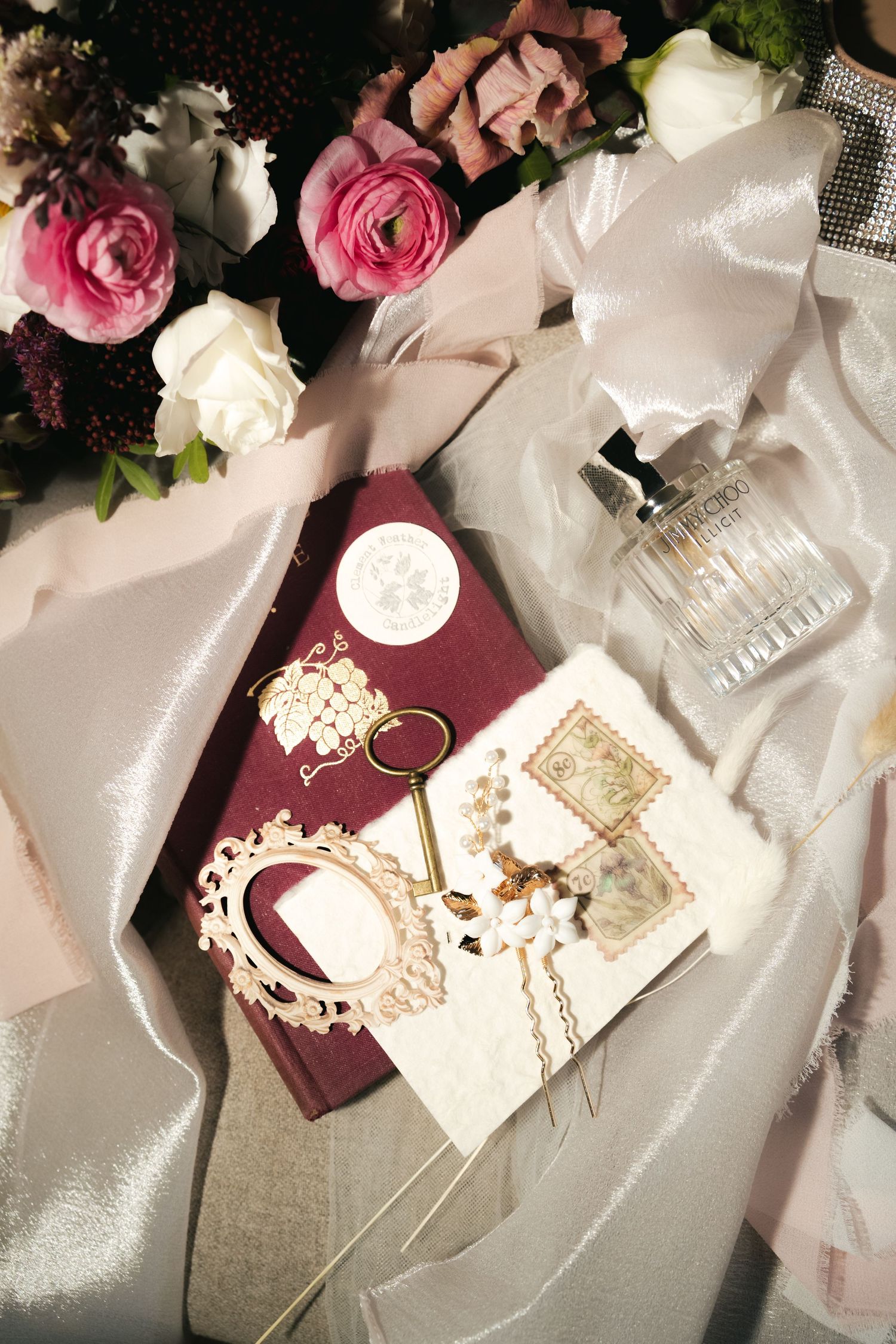 Wedding flatlay with rings, details, and flowers at South Farm Royston, captured by a UK London wedding photographer. @lyfphotos