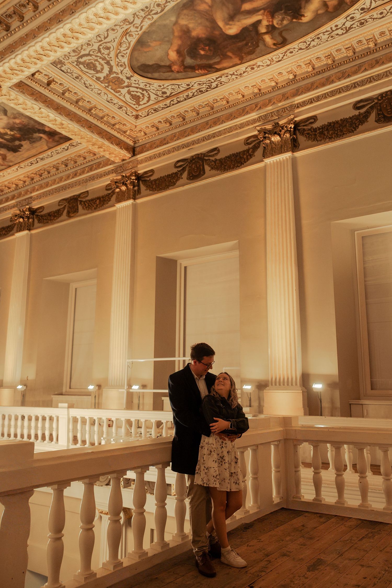 Romantic engagement portraits on Banqueting House balcony after surprise London proposal