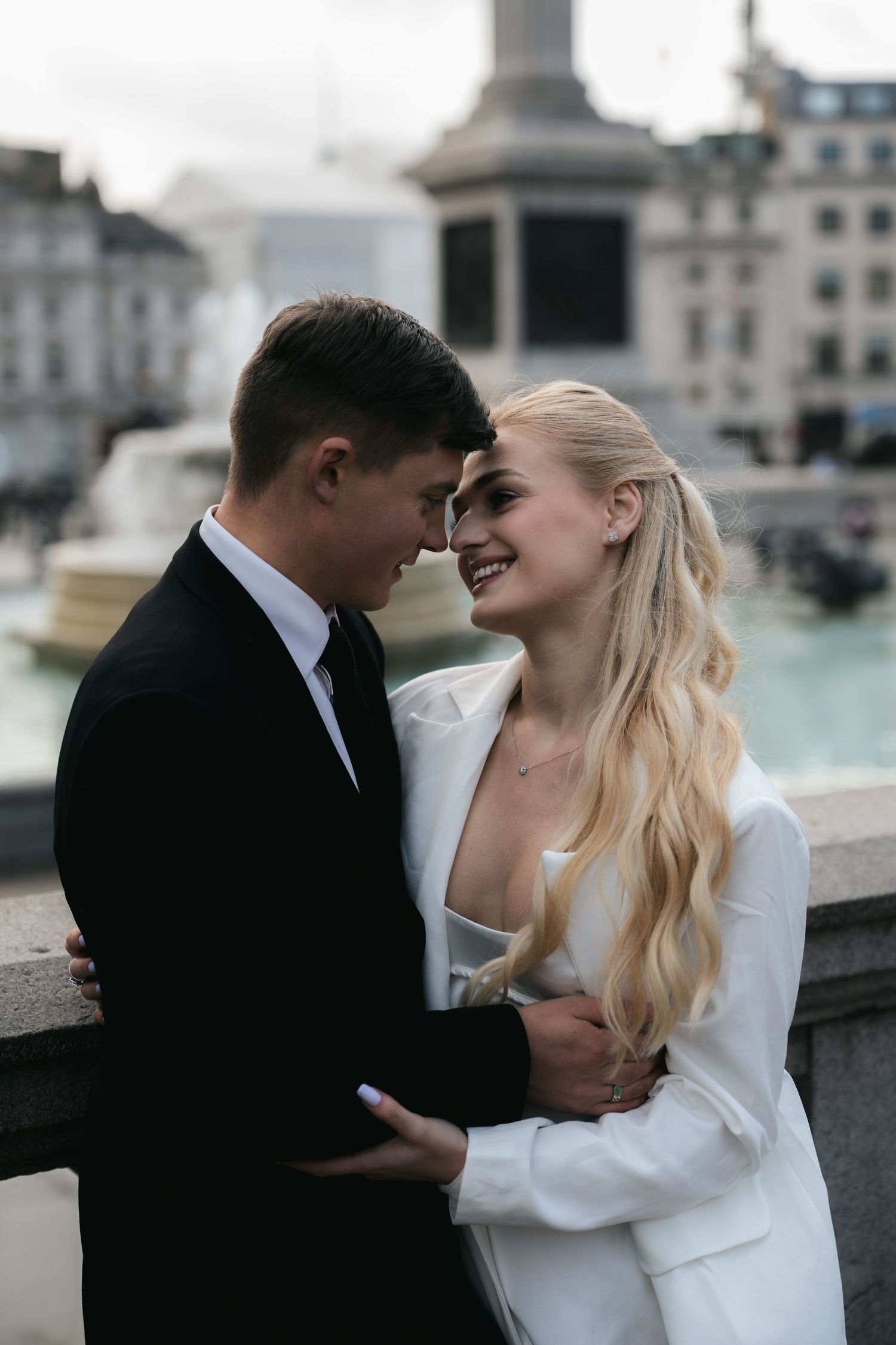 “Couple in Trafalgar Square by the National Gallery during a London couples photoshoot.”