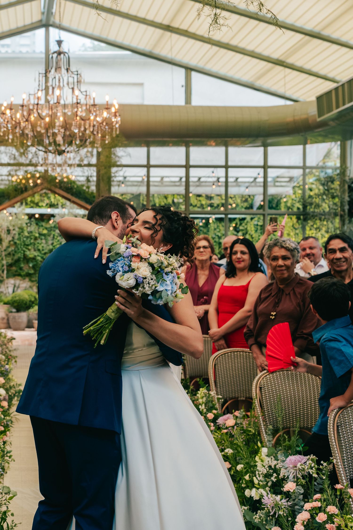 Emotional greenhouse wedding ceremony at Botânico Quintal in São Paulo, Brazil.