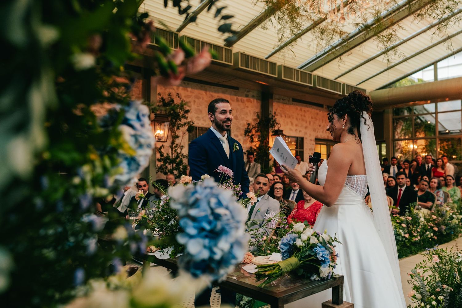 Emotional greenhouse wedding ceremony at Botânico Quintal in São Paulo, Brazil.