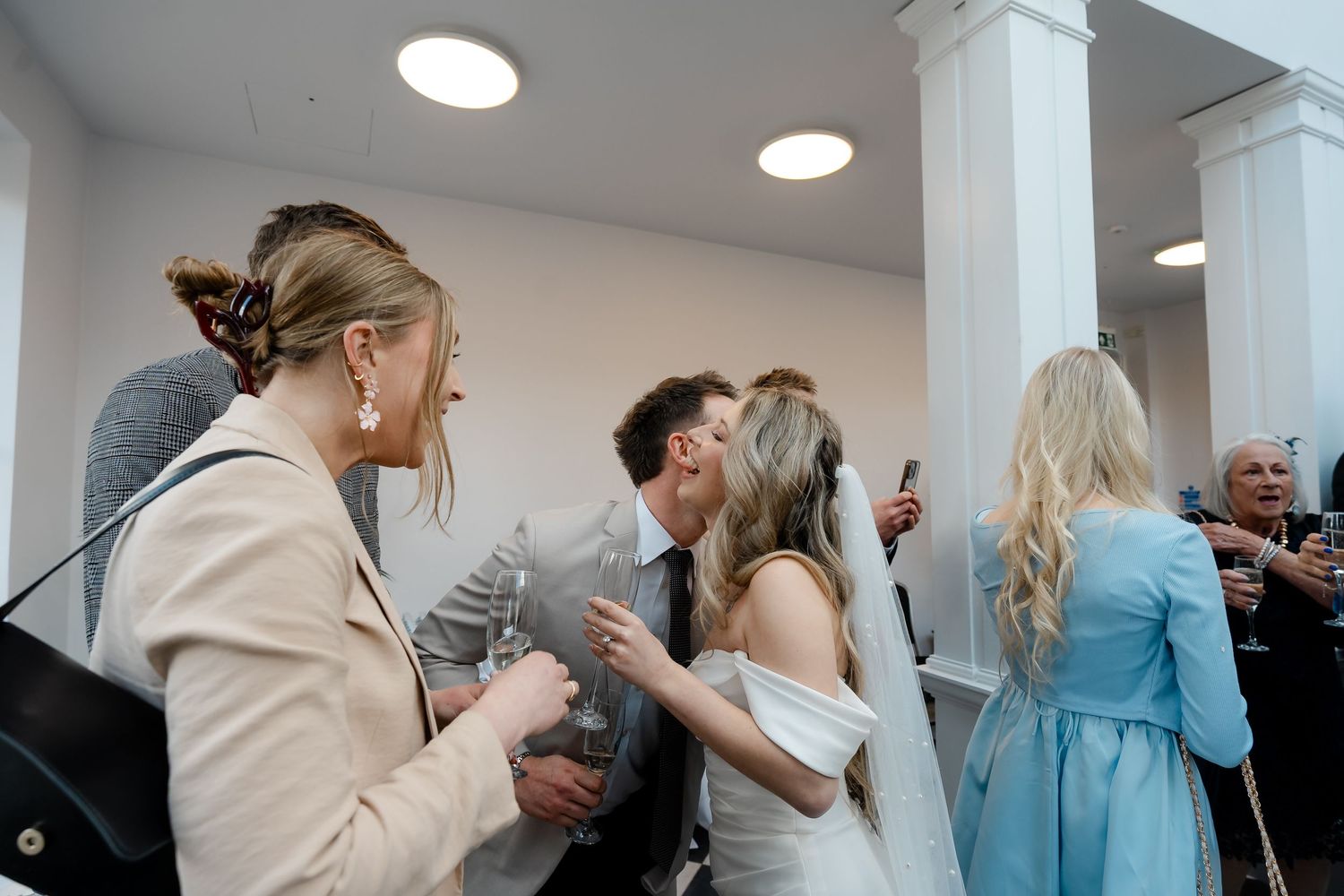 Guests enjoying cocktails in York House conservatory