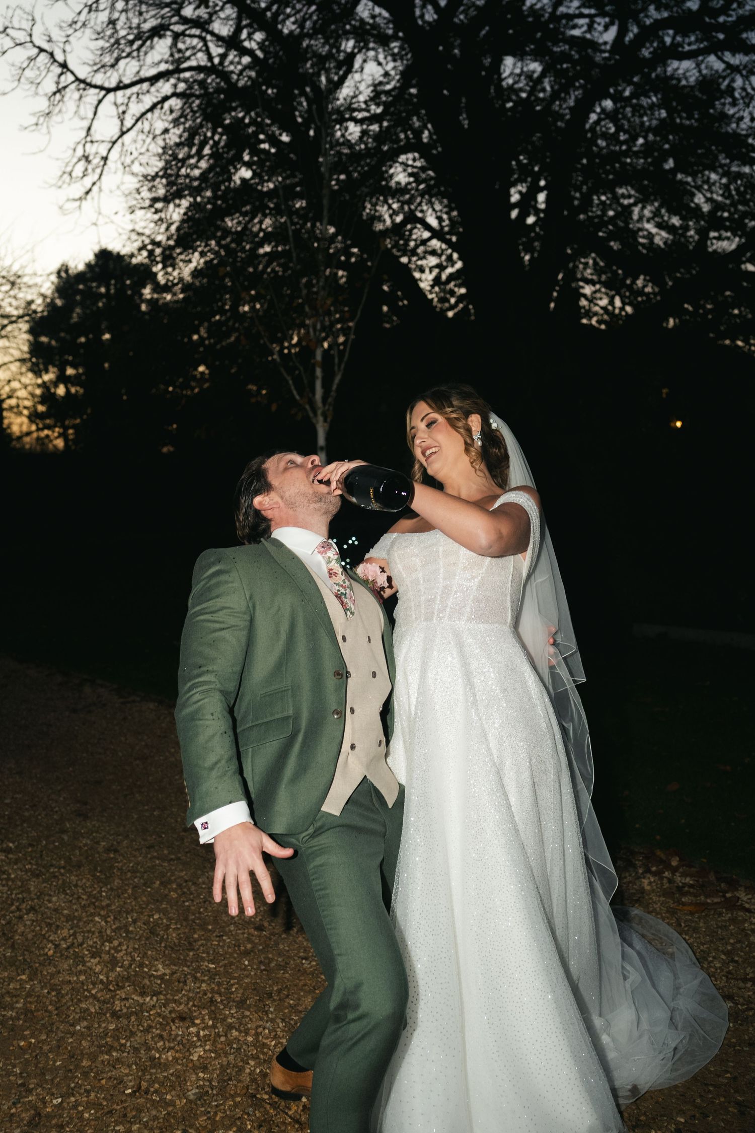 Wedding champagne spray celebration at South Farm editorial shoot captured by @lyfphotos