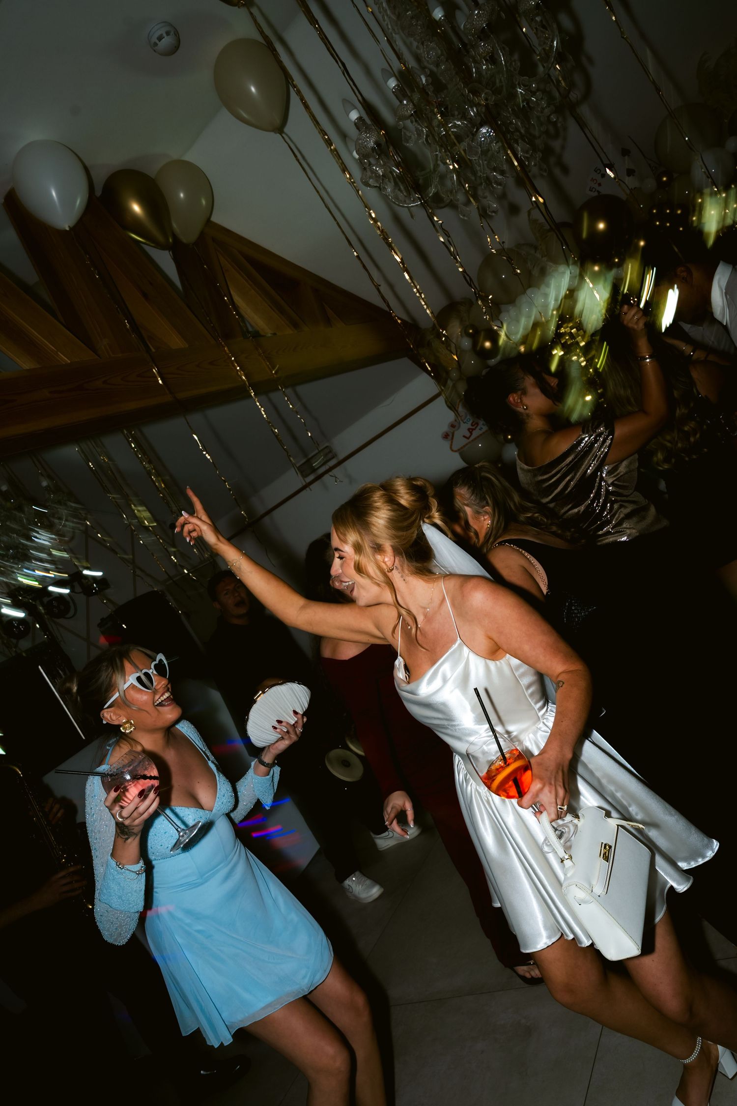 Guests celebrating at an elopement party at The Oaks Eltham in London by @lyfphotos