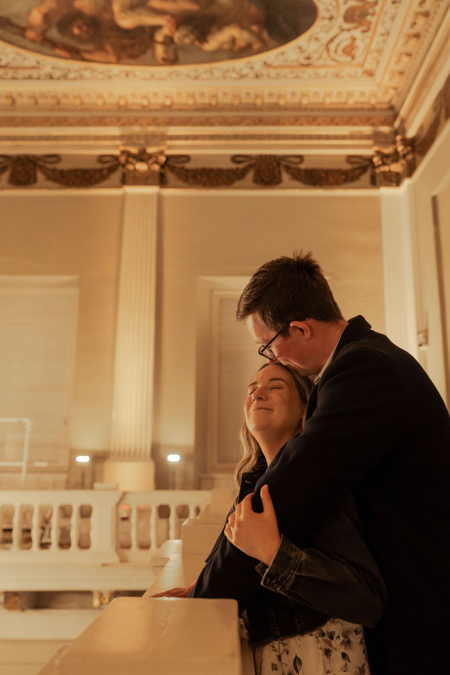 Romantic engagement portraits on Banqueting House balcony after surprise London proposal