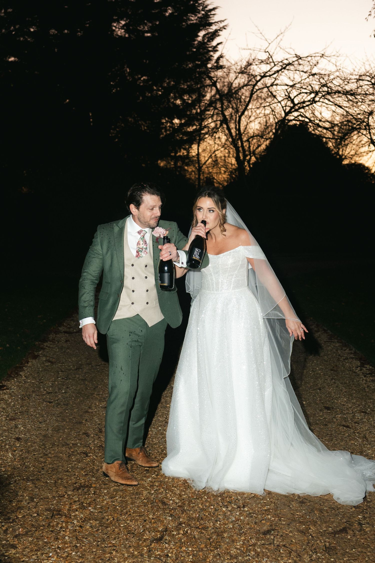 Wedding champagne spray celebration at South Farm editorial shoot captured by @lyfphotos