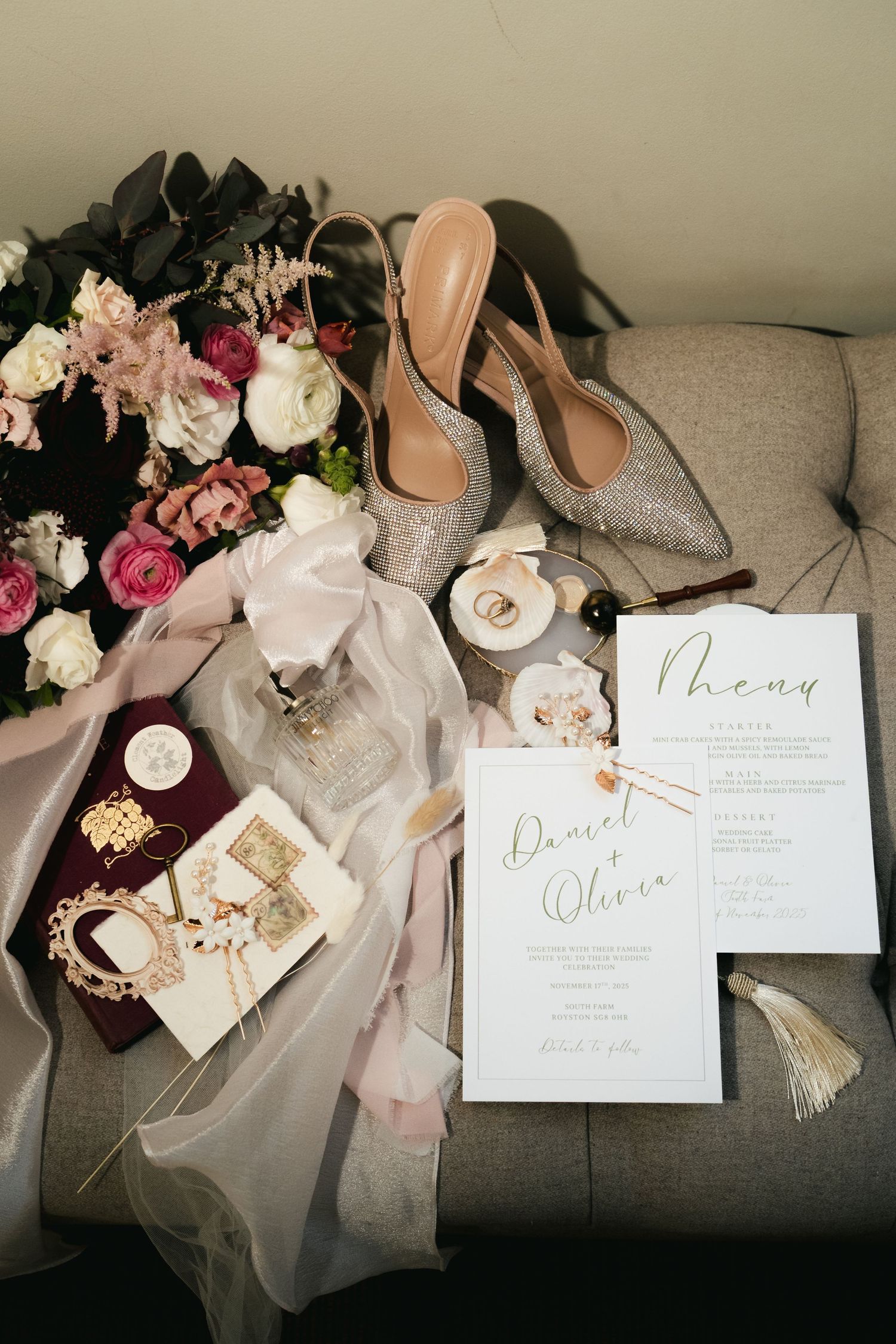Wedding flatlay with rings, details, and flowers at South Farm Royston, captured by a UK London wedding photographer. @lyfphotos