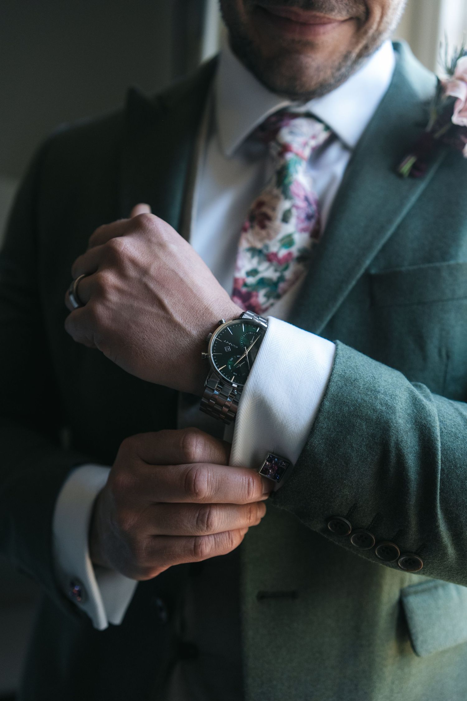 “Groom adjusting his tie before the ceremony at South Farm Royston, captured by a UK London wedding photographer.” @lyfphotos